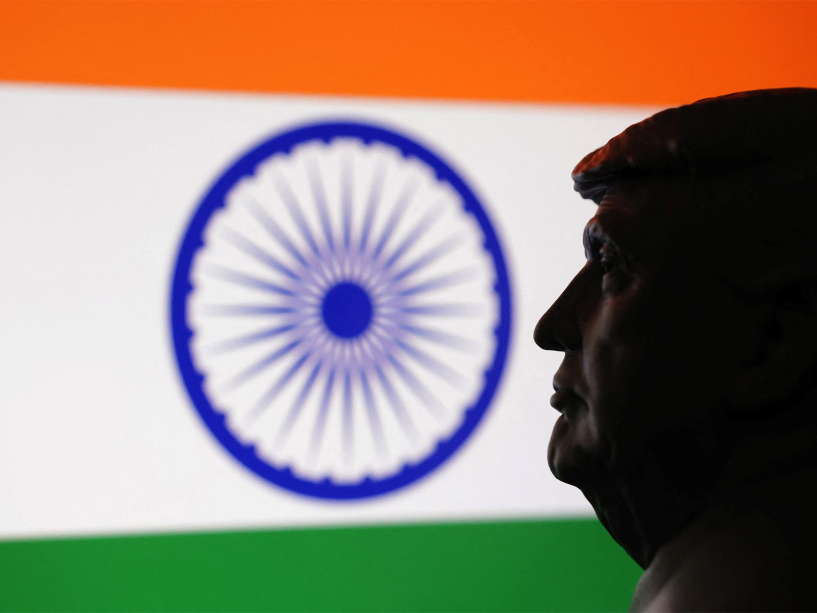 A 3D-printed miniature model of US President Donald Trump is seen alongside the Indian flag in this illustration. (Photo/Reuters) A 3D-printed miniature model of US President Donald Trump is seen alongside the Indian flag in this illustration. (Photo/Reuters)