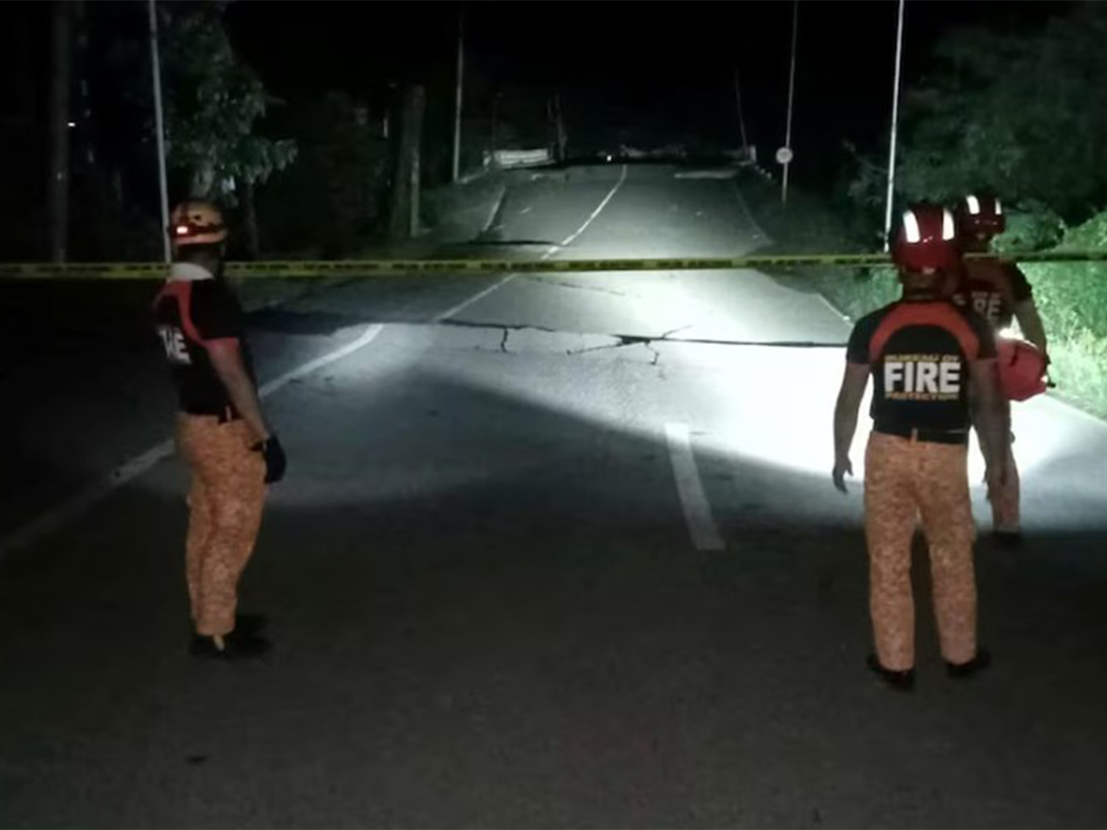 Rescue personnel stand in front of a damaged road after the earthquake (File Photo/ Reuters) Rescue personnel stand in front of a damaged road after the earthquake (File Photo/ Reuters)