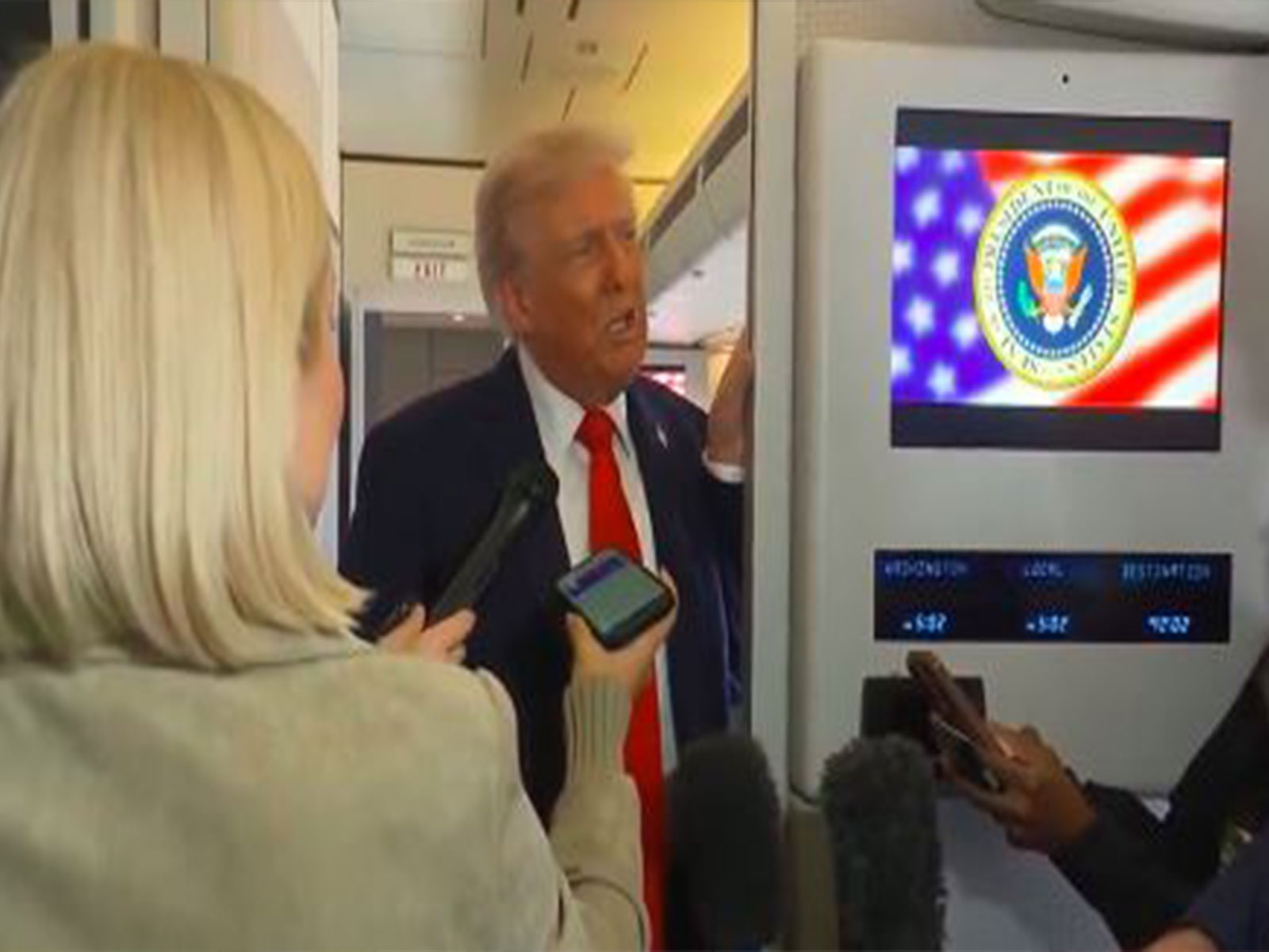 US President Donald Trump speaks to reporters aboard Air Force One (Photo/Reuters) US President Donald Trump speaks to reporters aboard Air Force One (Photo/Reuters)