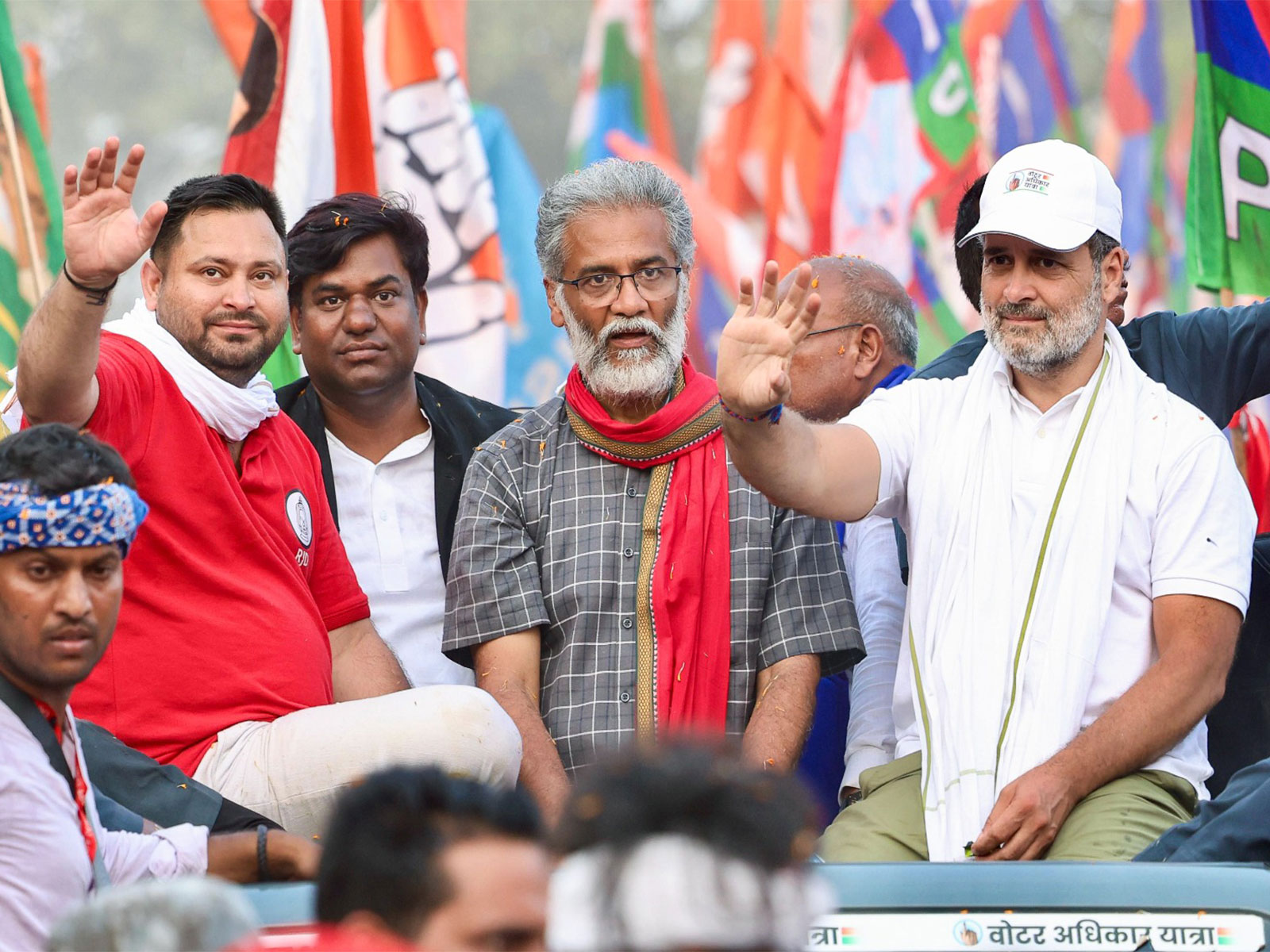 RJD leader Tejashwi Yadav,  CPI (ML) leader Dipankar Bhattacharya and Congress leader Rahul Gandhi  (File Photo/ANI) RJD leader Tejashwi Yadav,  CPI (ML) leader Dipankar Bhattacharya and Congress leader Rahul Gandhi  (File Photo/ANI)