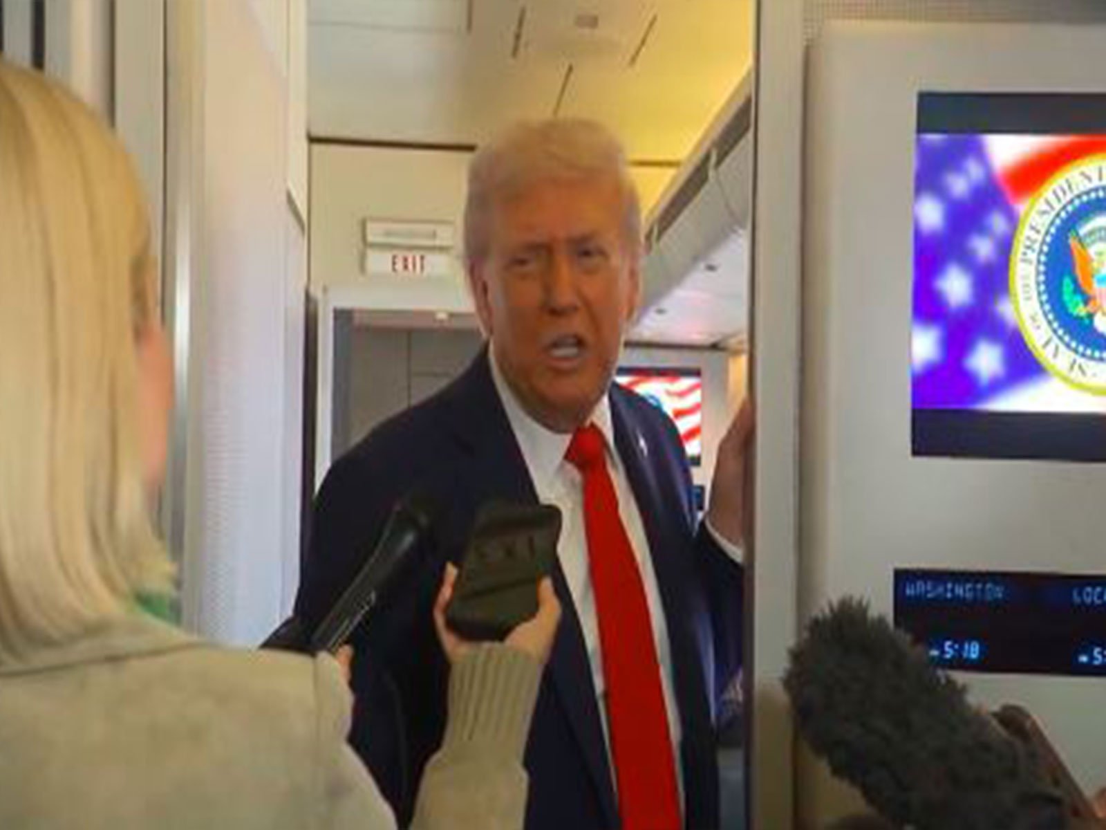 US President Donald Trump interacts with reporters aboard Air Force One. (Image Source: The White House) US President Donald Trump interacts with reporters aboard Air Force One. (Image Source: The White House)