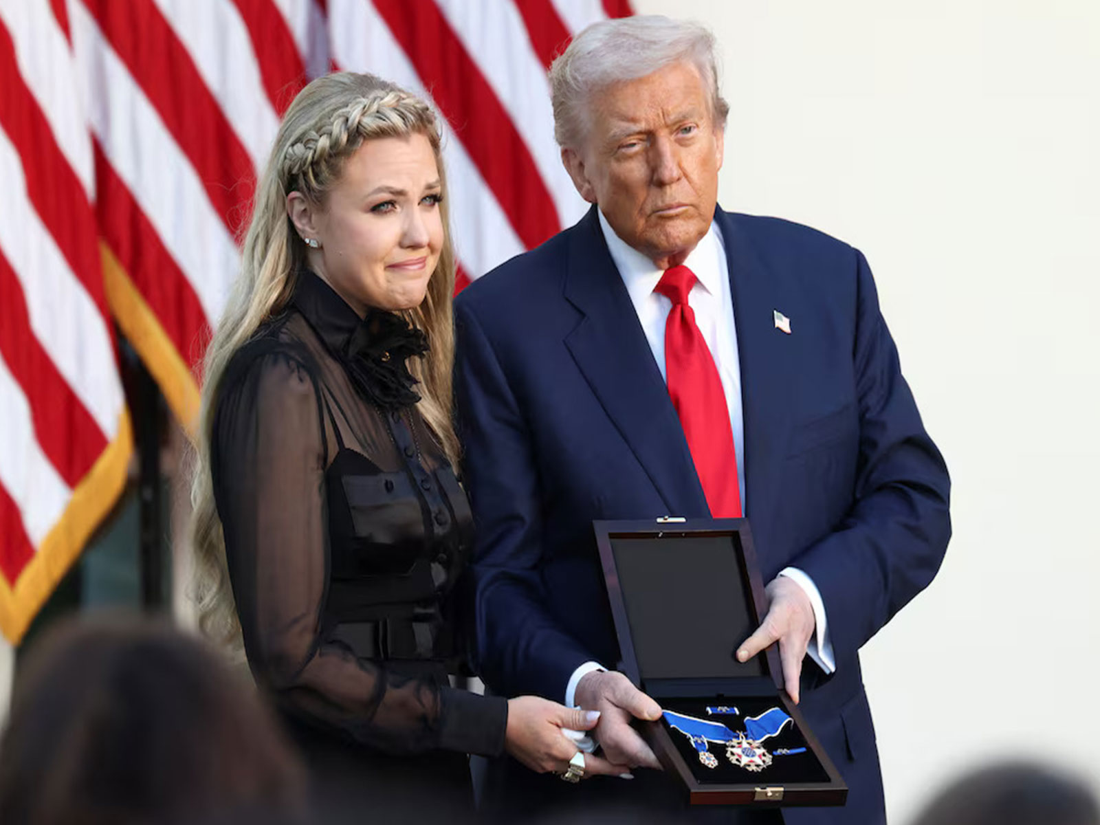 US President Donald Trump presents the Presidential Medal of Freedom to Erika Kirk during a ceremony at the White House. (Photo/Reuters) US President Donald Trump presents the Presidential Medal of Freedom to Erika Kirk during a ceremony at the White House. (Photo/Reuters)