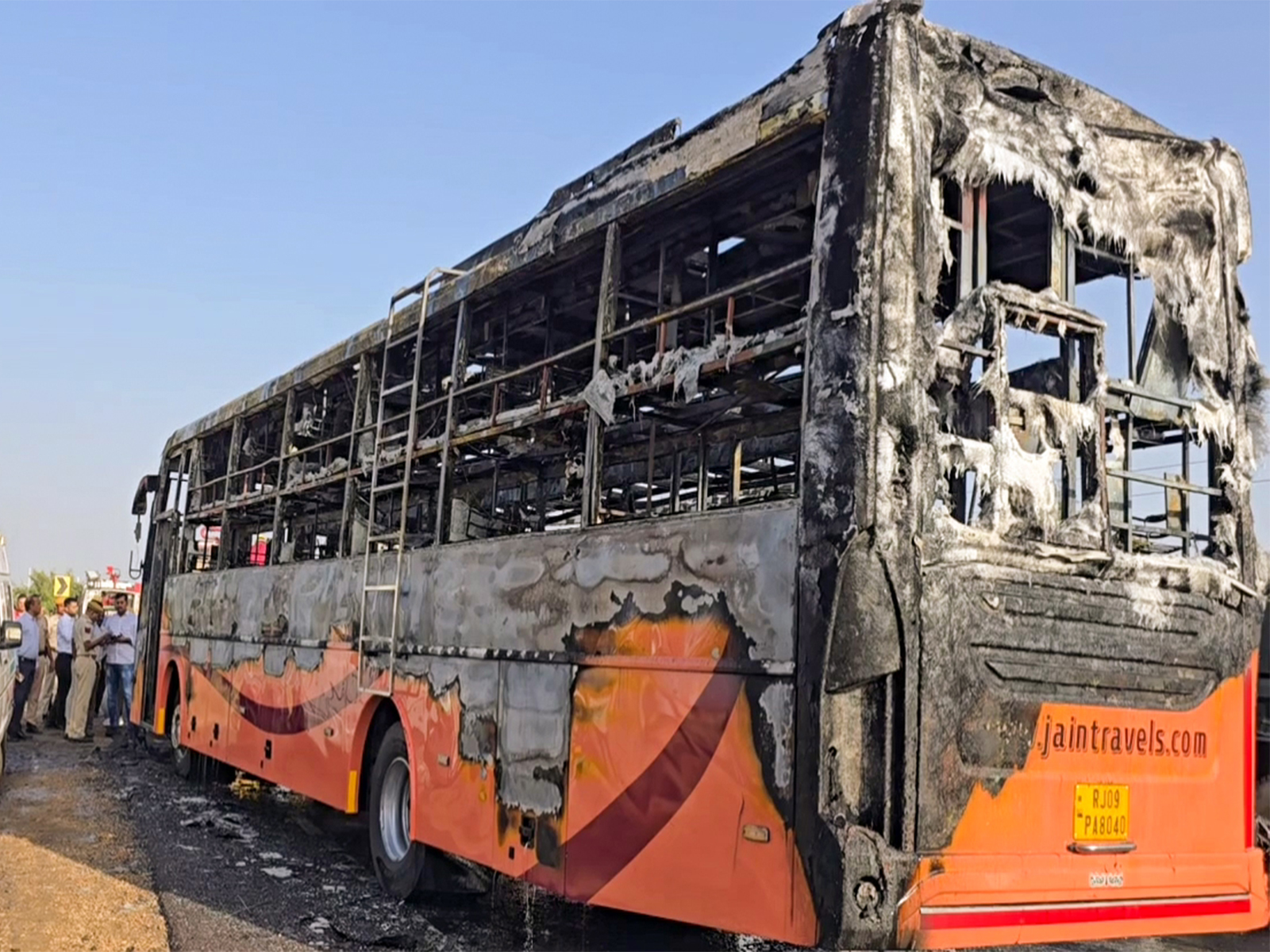 Bus enroute to Jodhpur caught fire near Thaiyat village in Jaisalmer on Tuesday. (Photo/ANI) Bus enroute to Jodhpur caught fire near Thaiyat village in Jaisalmer on Tuesday. (Photo/ANI)