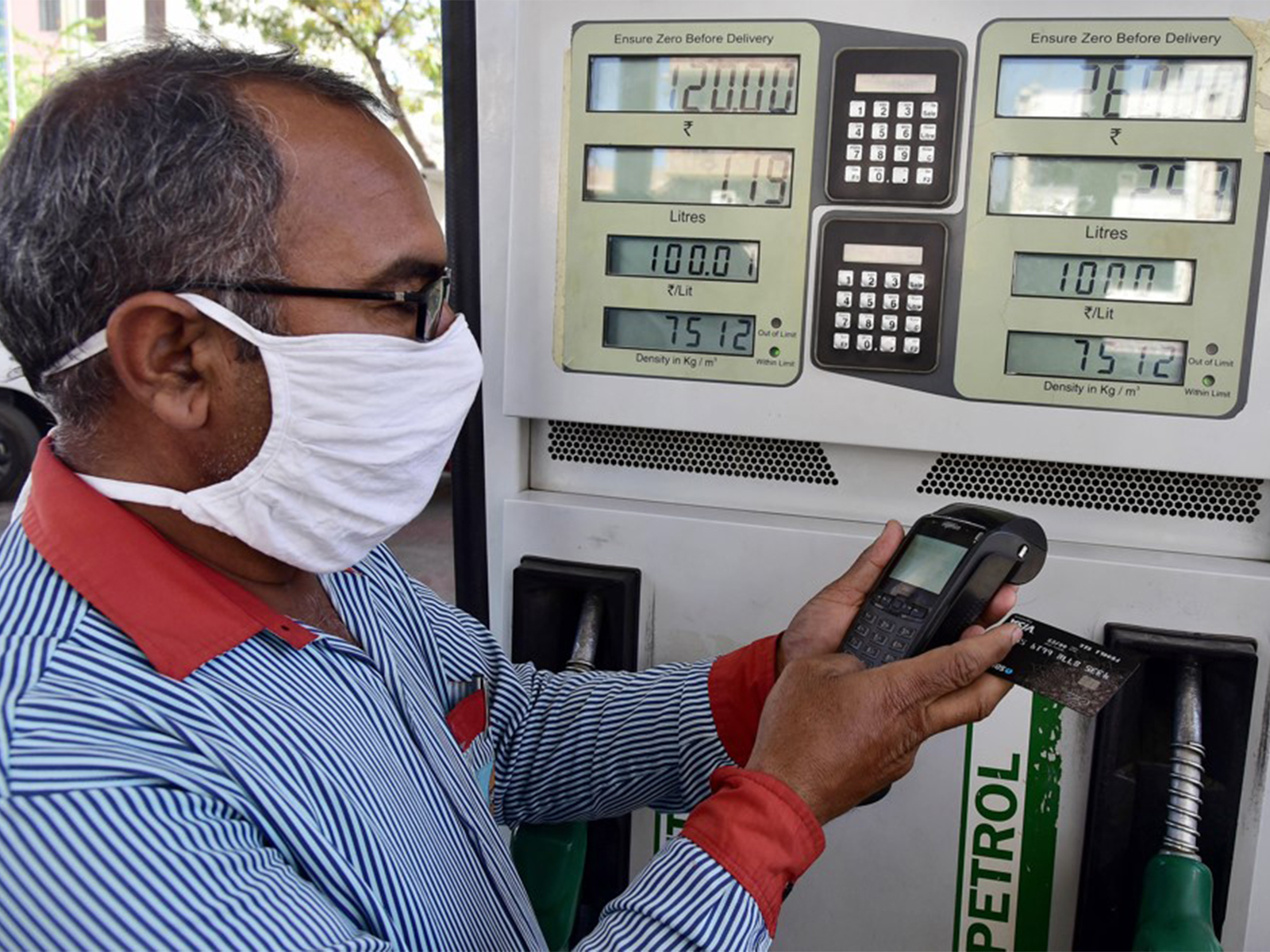 A person making fuel payment from a card (File Photo/ANI) A person making fuel payment from a card (File Photo/ANI)