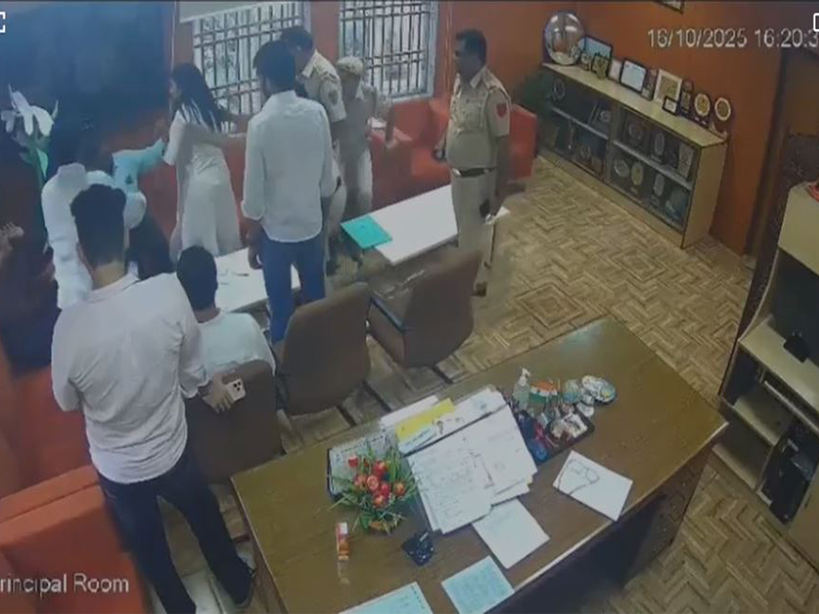 CCTV still of DUSU Joint Secretary Deepika Jha slapping Professor Sujit Kumar (Photo/Ambedkar College) CCTV still of DUSU Joint Secretary Deepika Jha slapping Professor Sujit Kumar (Photo/Ambedkar College)