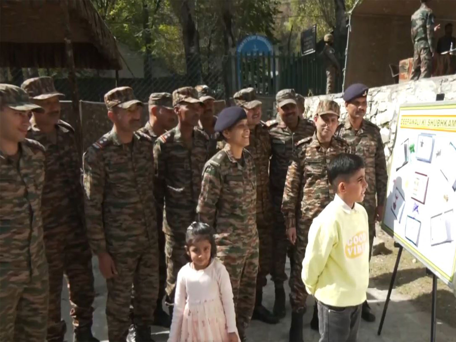 Indian Army officers near LOC in Tangdhar, celebrate Diwali with local children. (Photo/ANI) Indian Army officers near LOC in Tangdhar, celebrate Diwali with local children. (Photo/ANI)