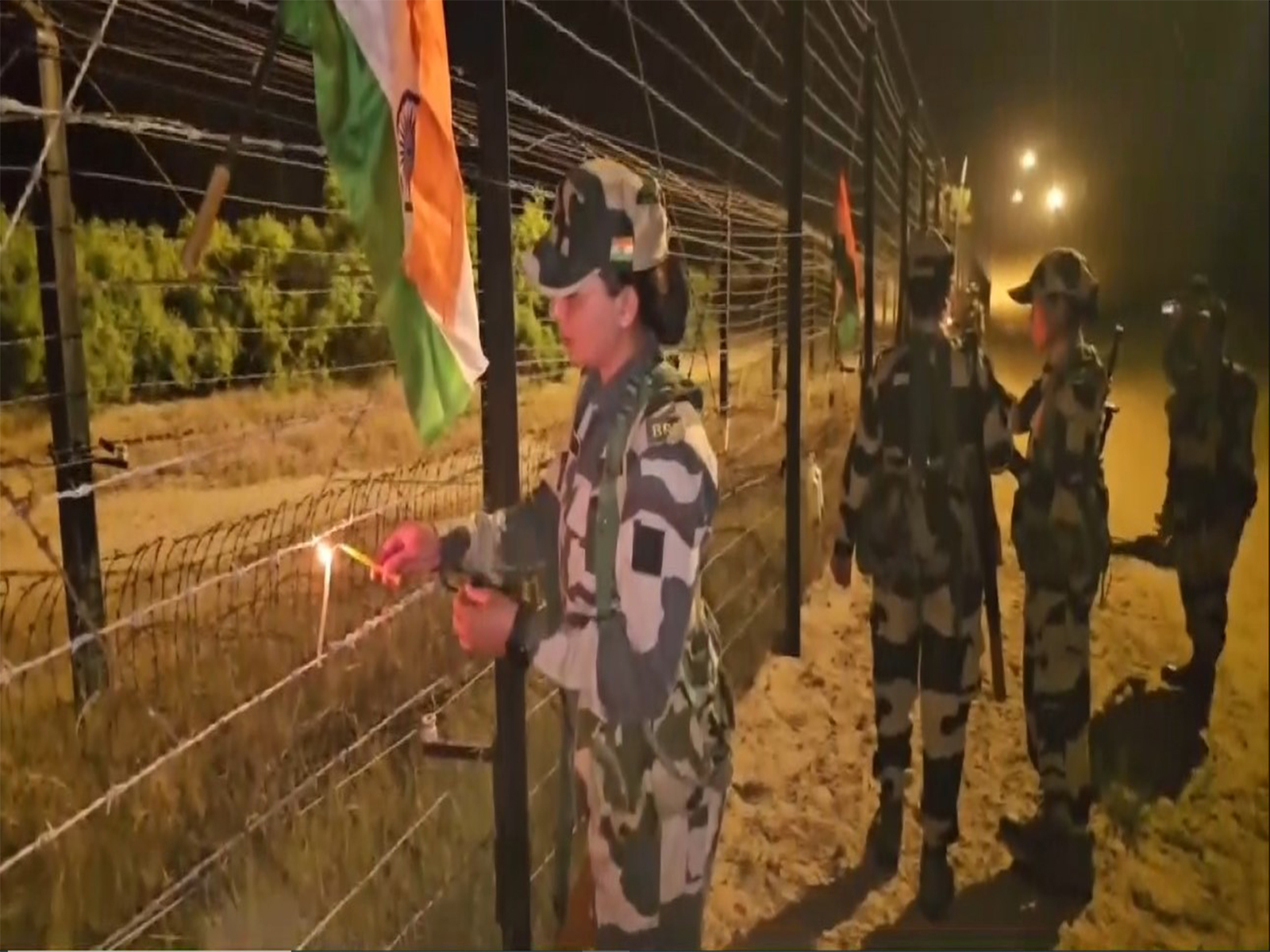 BSF celebrates Diwali by lighting candles along India-Pakistan border in Jaisalmer (Photo/ANI) BSF celebrates Diwali by lighting candles along India-Pakistan border in Jaisalmer (Photo/ANI)