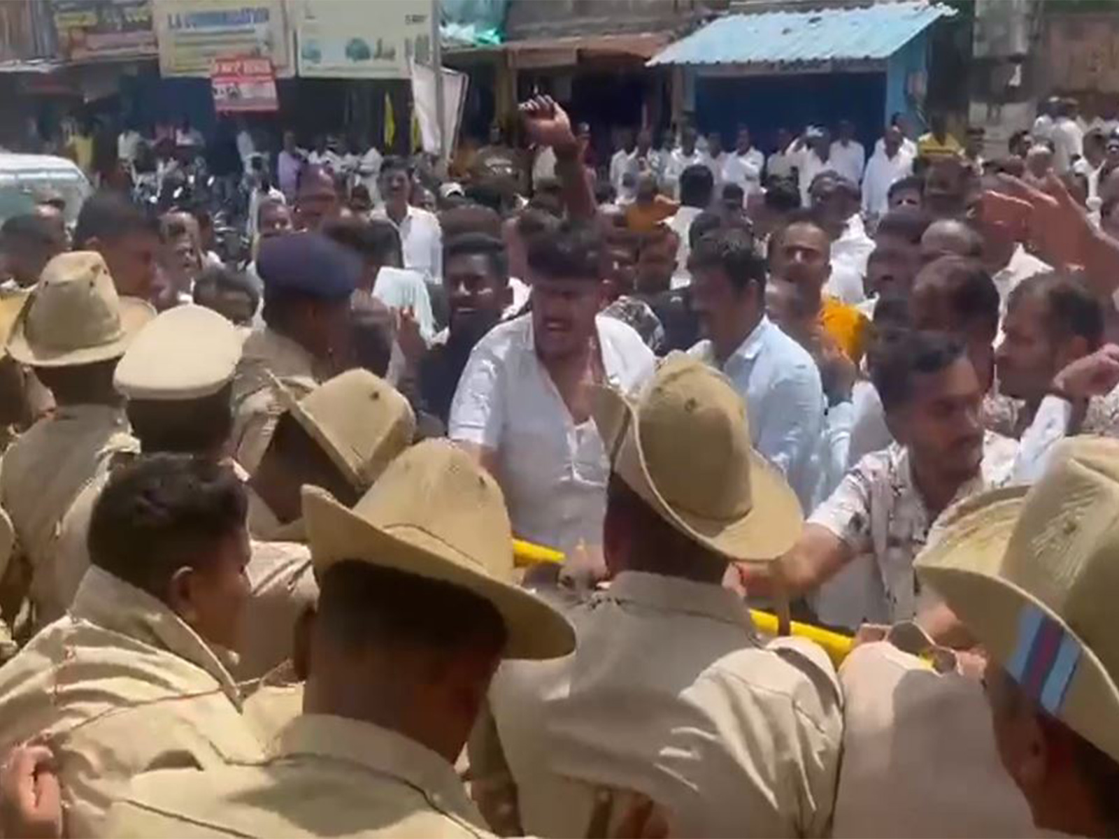 JD(S) party leaders protesting near main entrance of Hasanamba temple (Photo/ANI) JD(S) party leaders protesting near main entrance of Hasanamba temple (Photo/ANI)