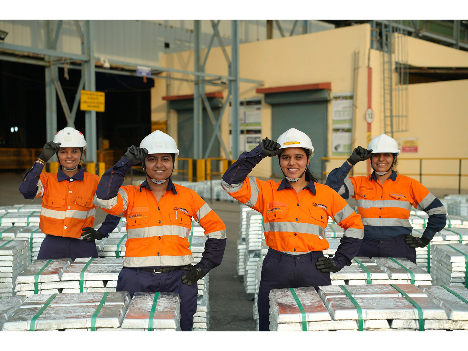 Hindustan Zinc employees with ingots Hindustan Zinc employees with ingots