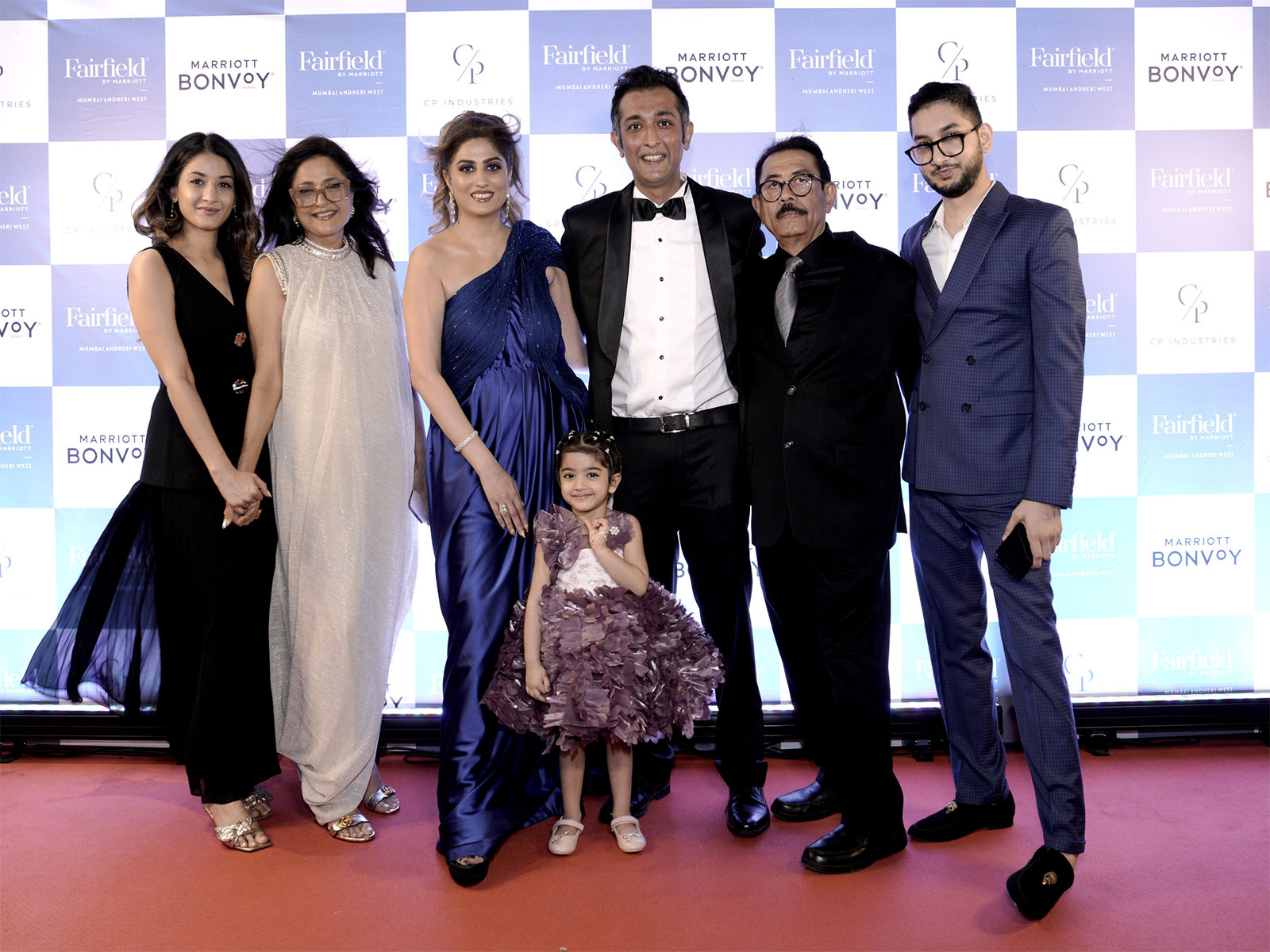 (L–R) Richa Patel, Alka Patel, Urvashi Patel, Karan Patel, Dinesh Patel, Aakash Patel, and Natali Patel (center), daughter of Karan and Urvashi Patel, at the launch event. (L–R) Richa Patel, Alka Patel, Urvashi Patel, Karan Patel, Dinesh Patel, Aakash Patel, and Natali Patel (center), daughter of Karan and Urvashi Patel, at the launch event.