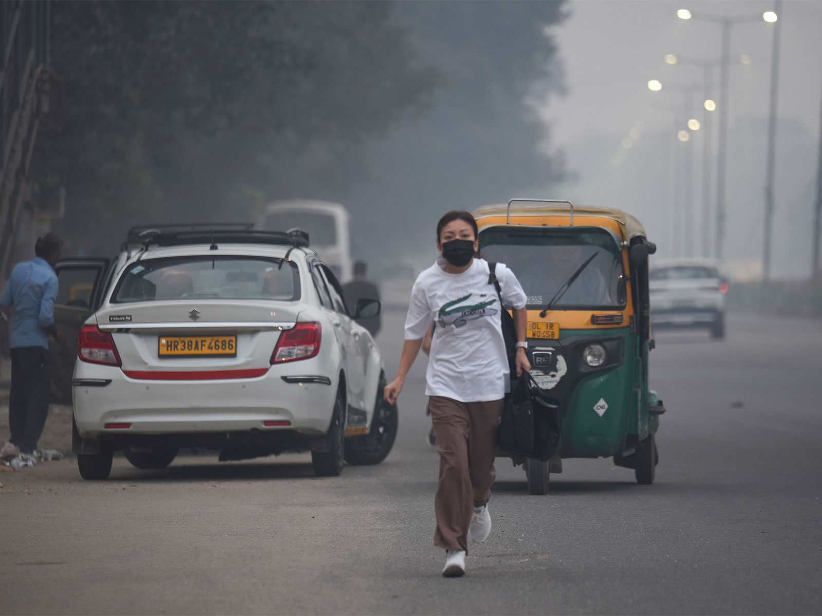 Commuters travel on the Ring Road area as the air quality in the national capital deteriorates to the 'Very Poor' category (Photo/ANI) Commuters travel on the Ring Road area as the air quality in the national capital deteriorates to the 'Very Poor' category (Photo/ANI)