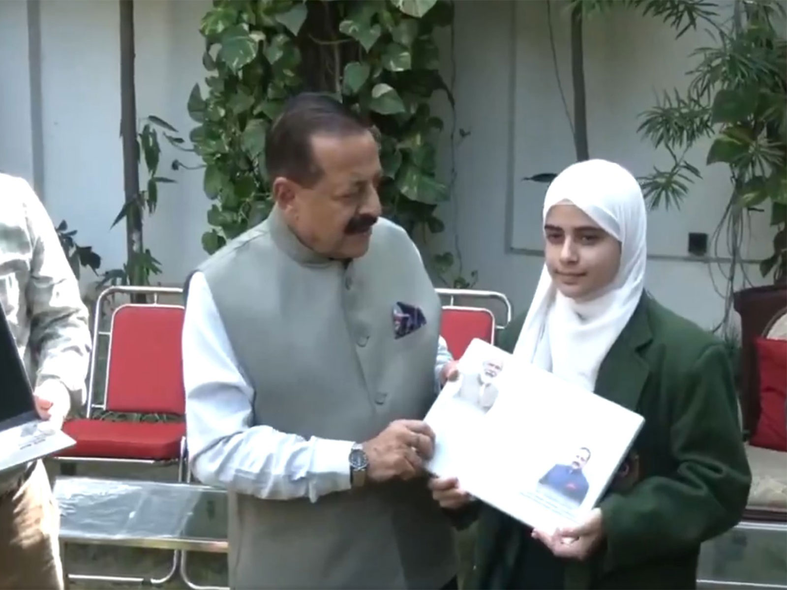 Dr Jitendra Singh distributing free laptops to top-performing female students. (Photo/ANI) Dr Jitendra Singh distributing free laptops to top-performing female students. (Photo/ANI)