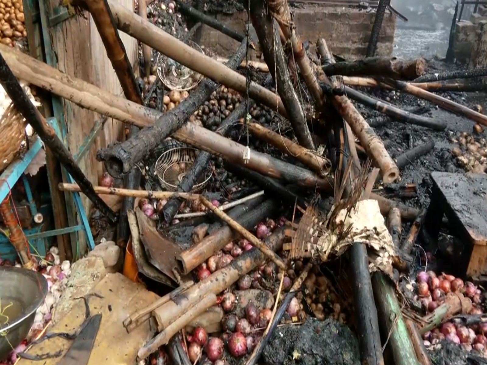 Vegetable market left charred after fire (Photo/ANI) Vegetable market left charred after fire (Photo/ANI)
