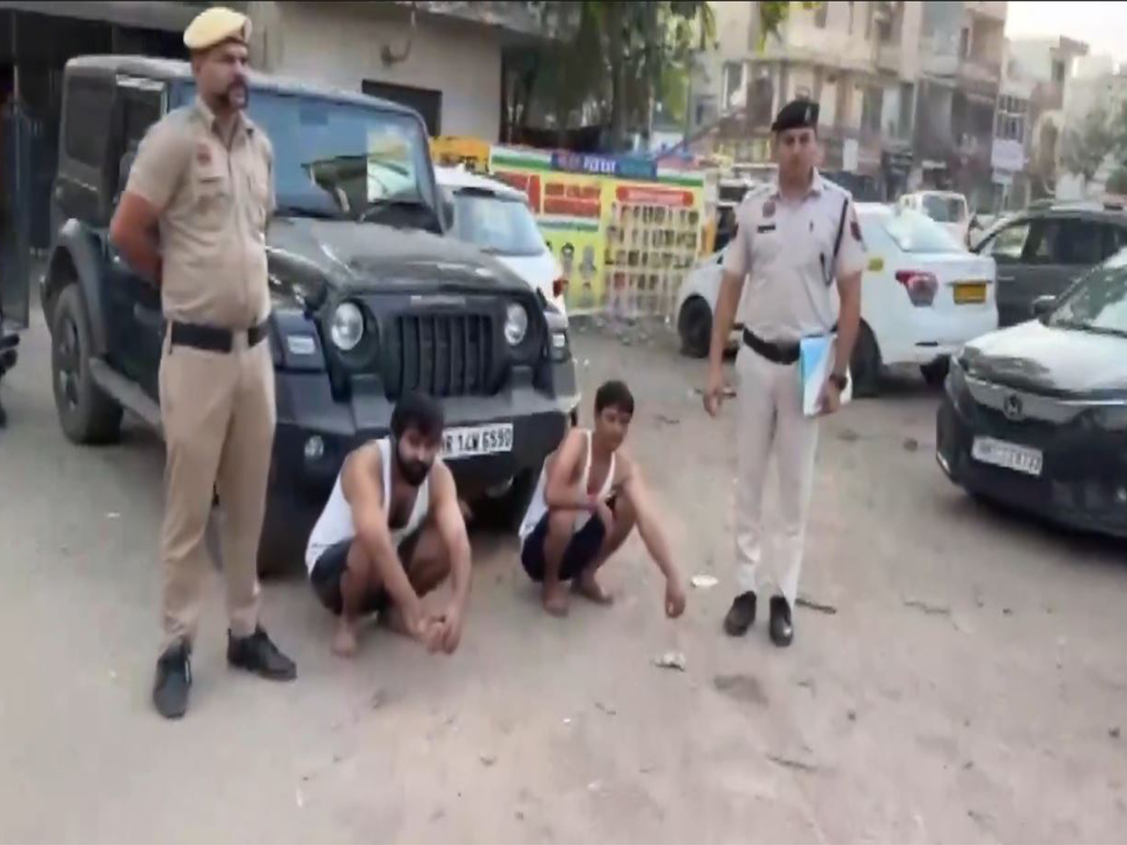 Two arrested in Gurugram for public urination from moving car (Photo: Police Media Cell) Two arrested in Gurugram for public urination from moving car (Photo: Police Media Cell)