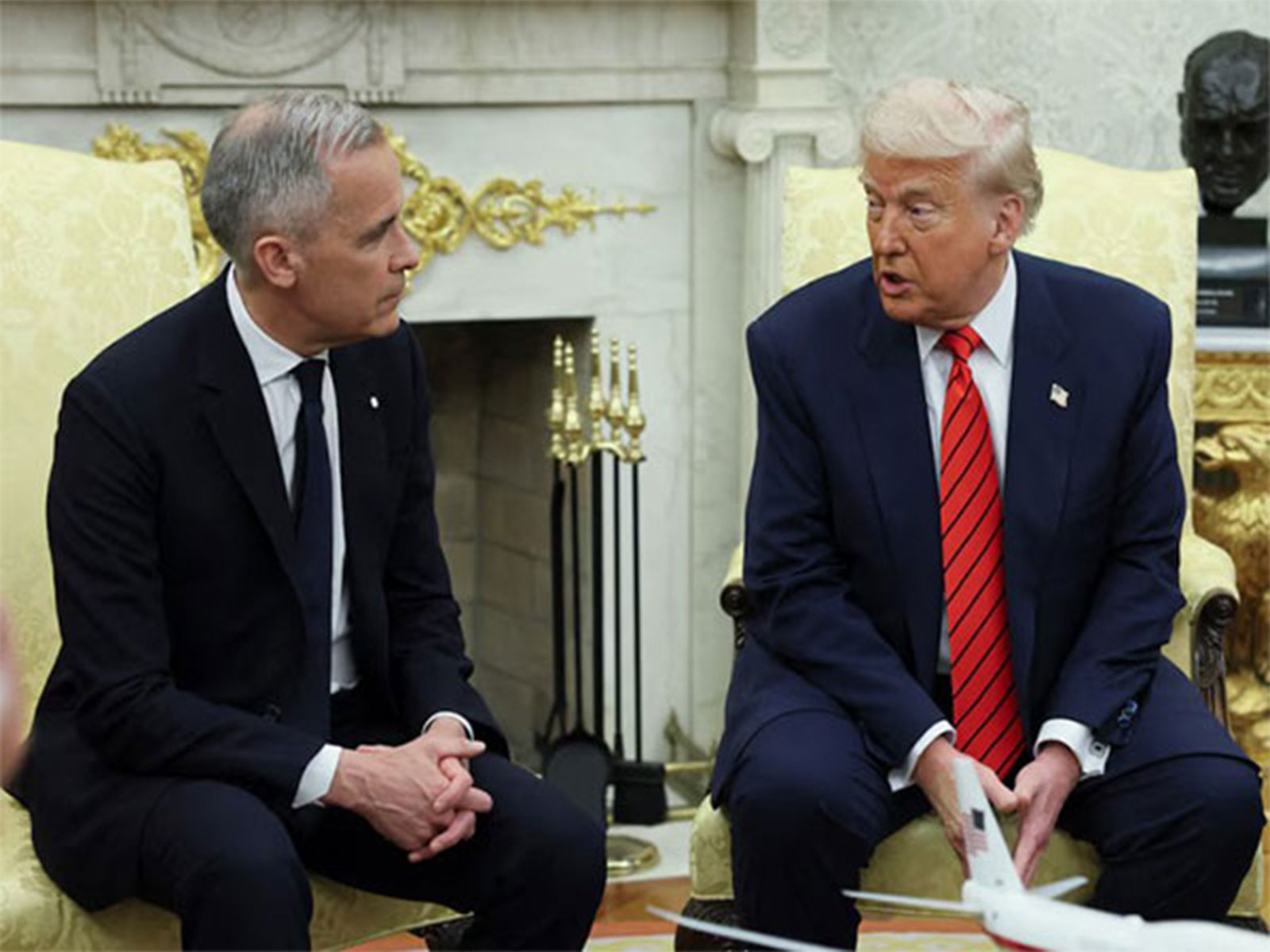 Canadian Prime Minister Mark Carney (on left) and US President Donald Trump (File Photo/Reuters) Canadian Prime Minister Mark Carney (on left) and US President Donald Trump (File Photo/Reuters)