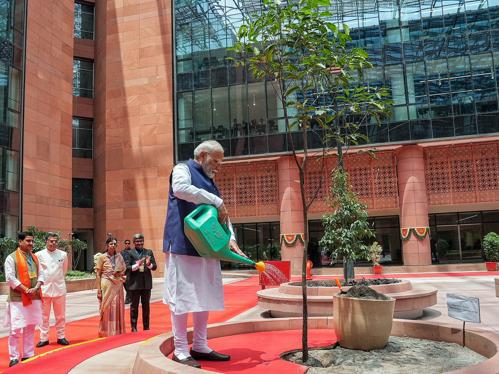 Prime Minister Narendra Modi plants a tree on the premises of the Kartavya Bhavan (File Photo/ANI) Prime Minister Narendra Modi plants a tree on the premises of the Kartavya Bhavan (File Photo/ANI)