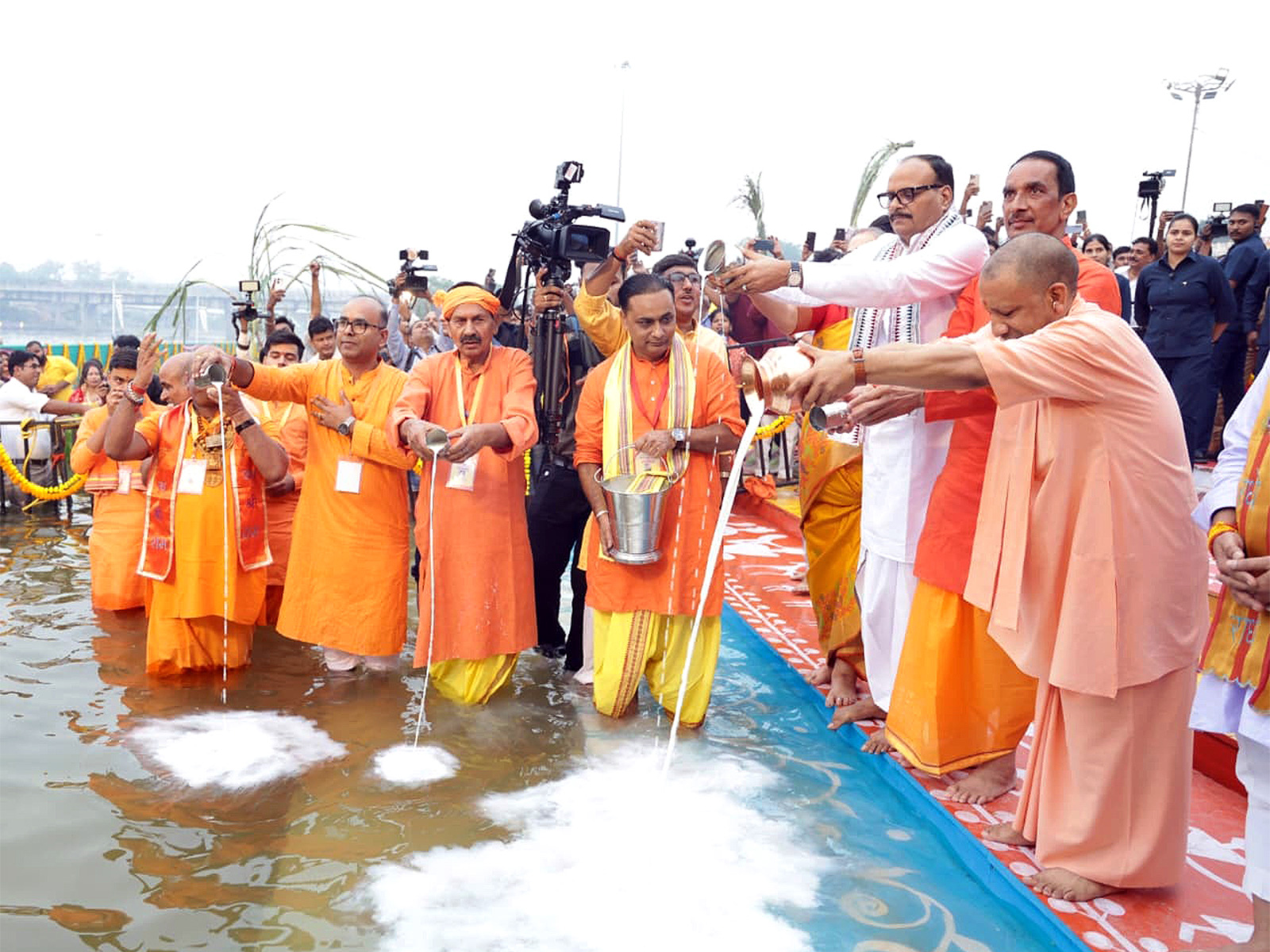 Uttar Pradesh CM Yogi Adityanath participates in Chhath Puja rituals. (Photo/ANI) Uttar Pradesh CM Yogi Adityanath participates in Chhath Puja rituals. (Photo/ANI)