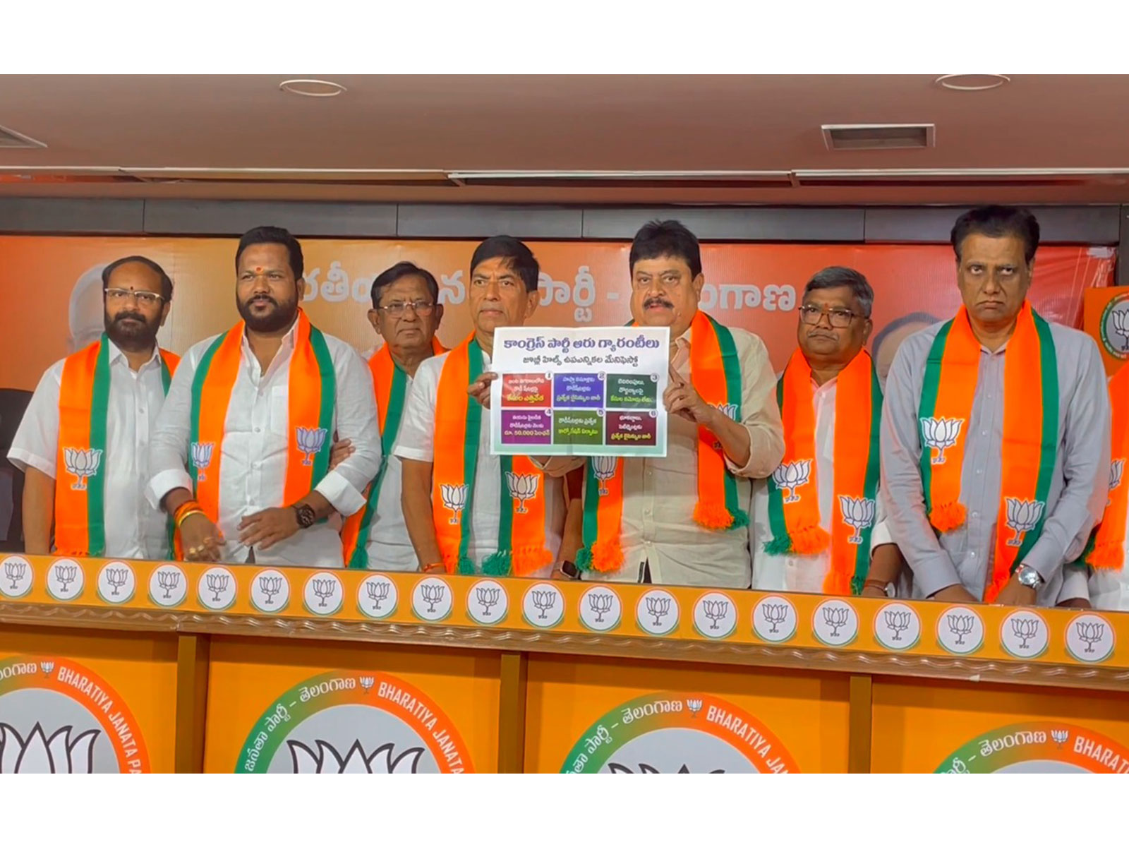 Telangana BJP releases poster mocking Congress poll promises. (Photo/ANI) Telangana BJP releases poster mocking Congress poll promises. (Photo/ANI)