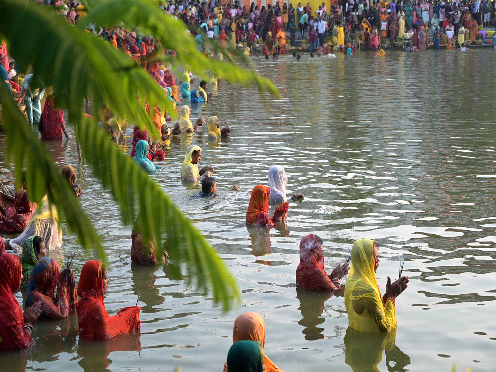 Devotees perform rituals during Chhat Puja (Photo/ANI) Devotees perform rituals during Chhat Puja (Photo/ANI)