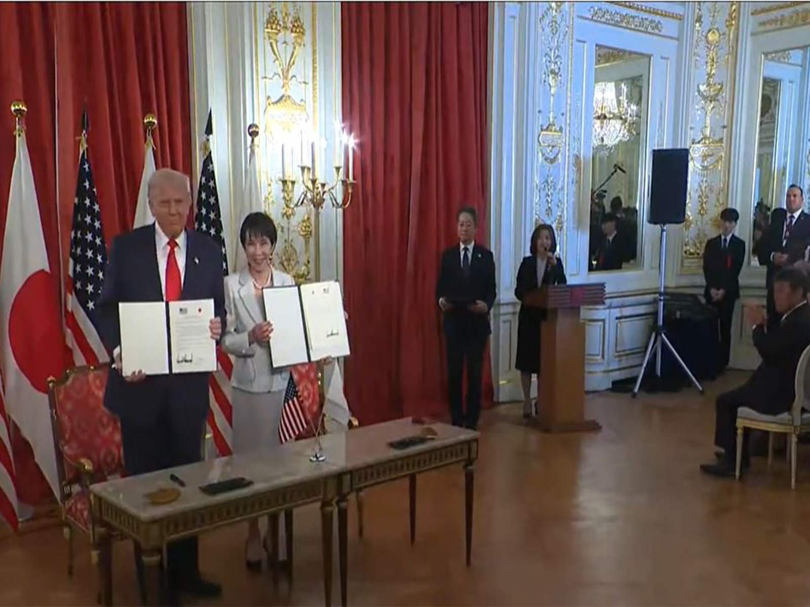 US President Donald Trump and Japanese Prime Minister Sanae Takaichi hold signed agreements during a ceremony in Tokyo. (Image: The White House/YouTube) US President Donald Trump and Japanese Prime Minister Sanae Takaichi hold signed agreements during a ceremony in Tokyo. (Image: The White House/YouTube)