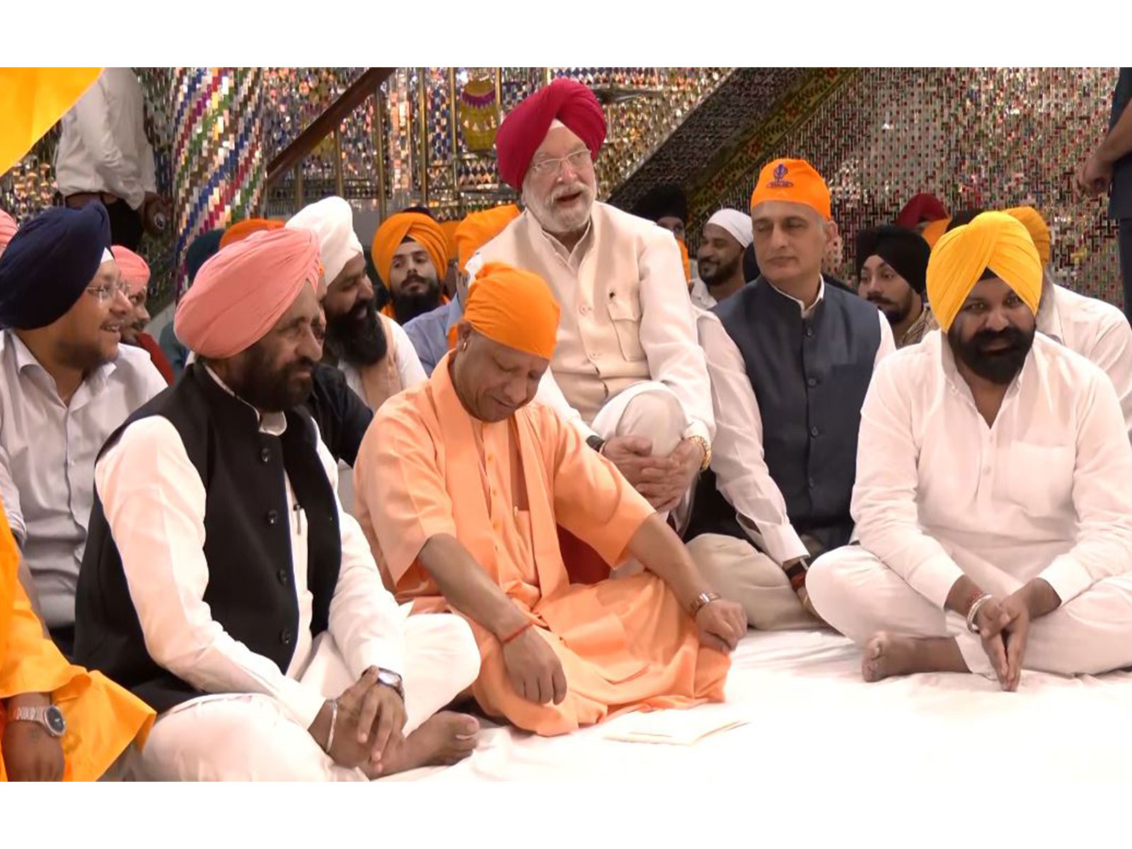 Uttar Pradesh CM Yogi Adityanath, along with Union Minister Hardeep Singh Puri, attends welcoming of the Holy Jore Sahib (Photo/ANI) Uttar Pradesh CM Yogi Adityanath, along with Union Minister Hardeep Singh Puri, attends welcoming of the Holy Jore Sahib (Photo/ANI)