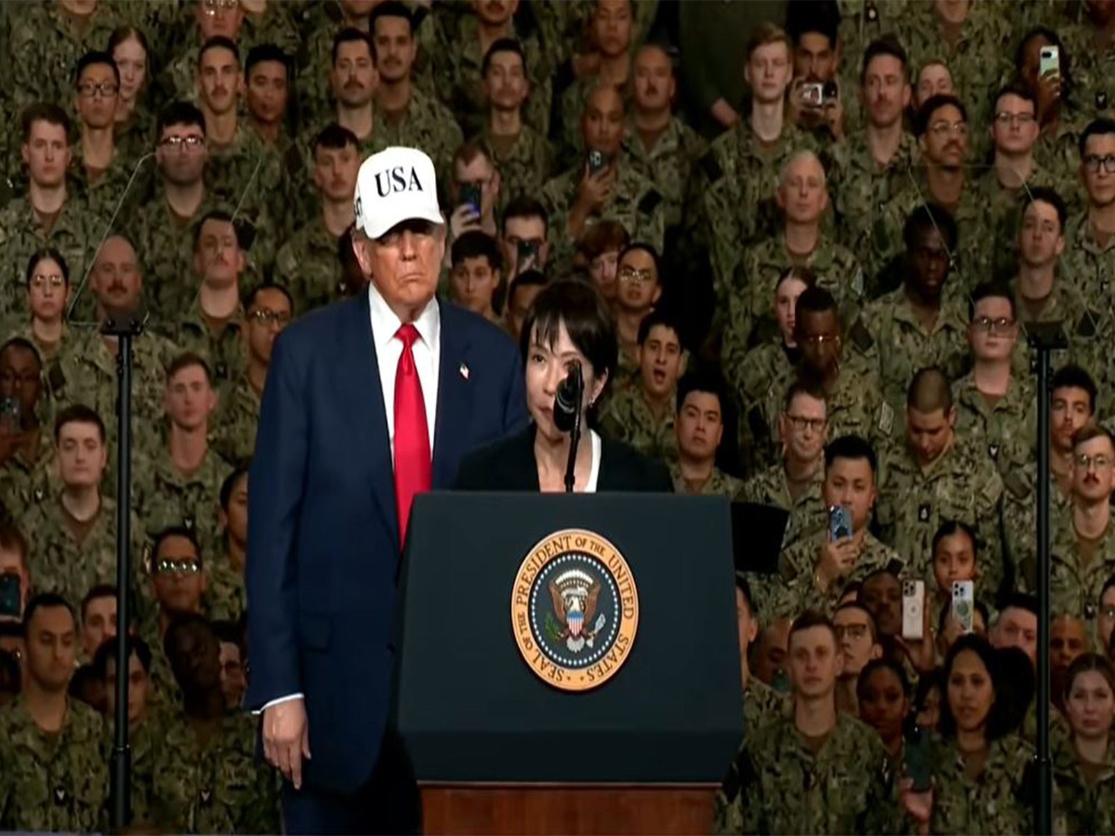 Japanese Prime Minister Sanae Takaichi addresses US troops aboard the USS George Washington at Yokosuka Naval Base. (Image Source: The White House/YouTube) Japanese Prime Minister Sanae Takaichi addresses US troops aboard the USS George Washington at Yokosuka Naval Base. (Image Source: The White House/YouTube)