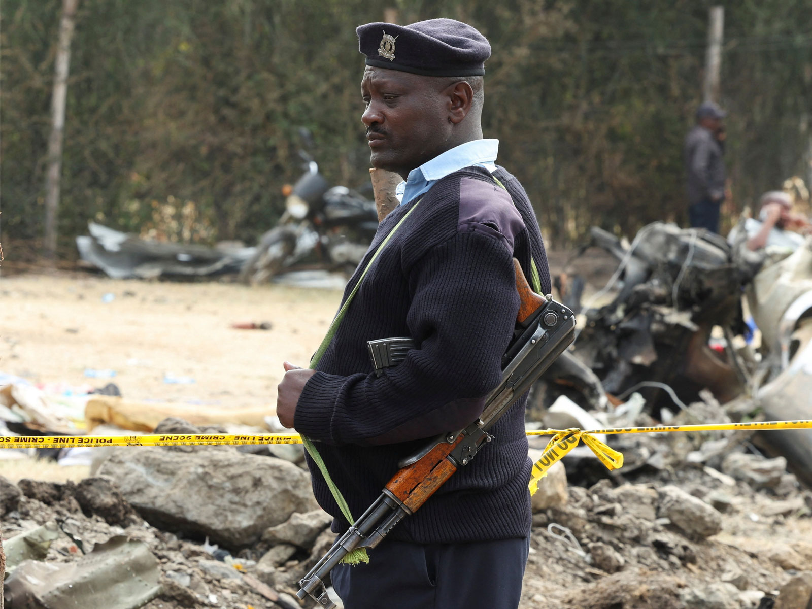 A policeman stands guard at the scene where a Cessna plane crashed into buildings in Nairobi, Kenya (File Photo/Reuters)  A policeman stands guard at the scene where a Cessna plane crashed into buildings in Nairobi, Kenya (File Photo/Reuters)