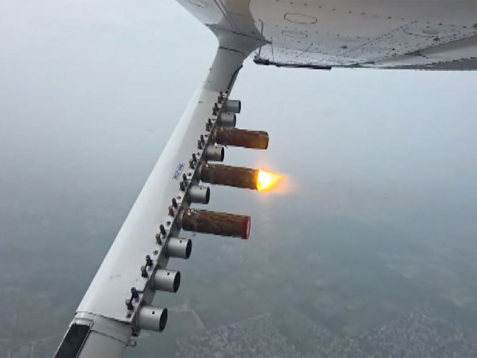 Visuals from the aircraft that salt-based and silver iodide flares into clouds in Delhi to induce rain (Photo/IIT Kanpur Media Cell) Visuals from the aircraft that salt-based and silver iodide flares into clouds in Delhi to induce rain (Photo/IIT Kanpur Media Cell)