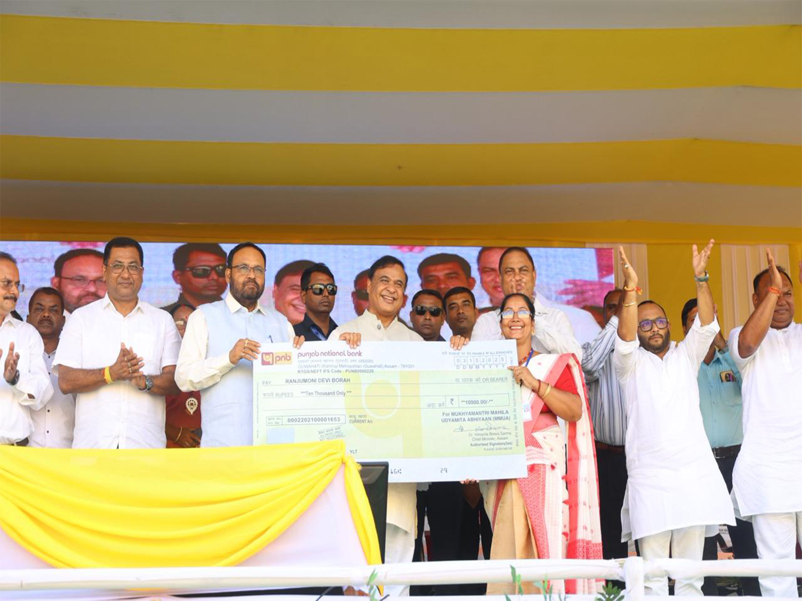 Assam CM Himanta Biswa Sarma distributes cheques under Mahila Udyamita Abhiyan (Photo/@himantabiswa) Assam CM Himanta Biswa Sarma distributes cheques under Mahila Udyamita Abhiyan (Photo/@himantabiswa)