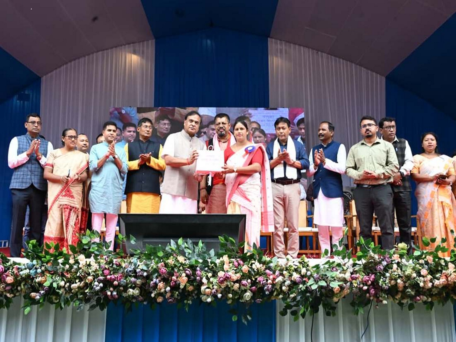 Assam Chief Minister Himanta Biswa Sarma presents cheques to beneficaries (Photo/ANI) Assam Chief Minister Himanta Biswa Sarma presents cheques to beneficaries (Photo/ANI)