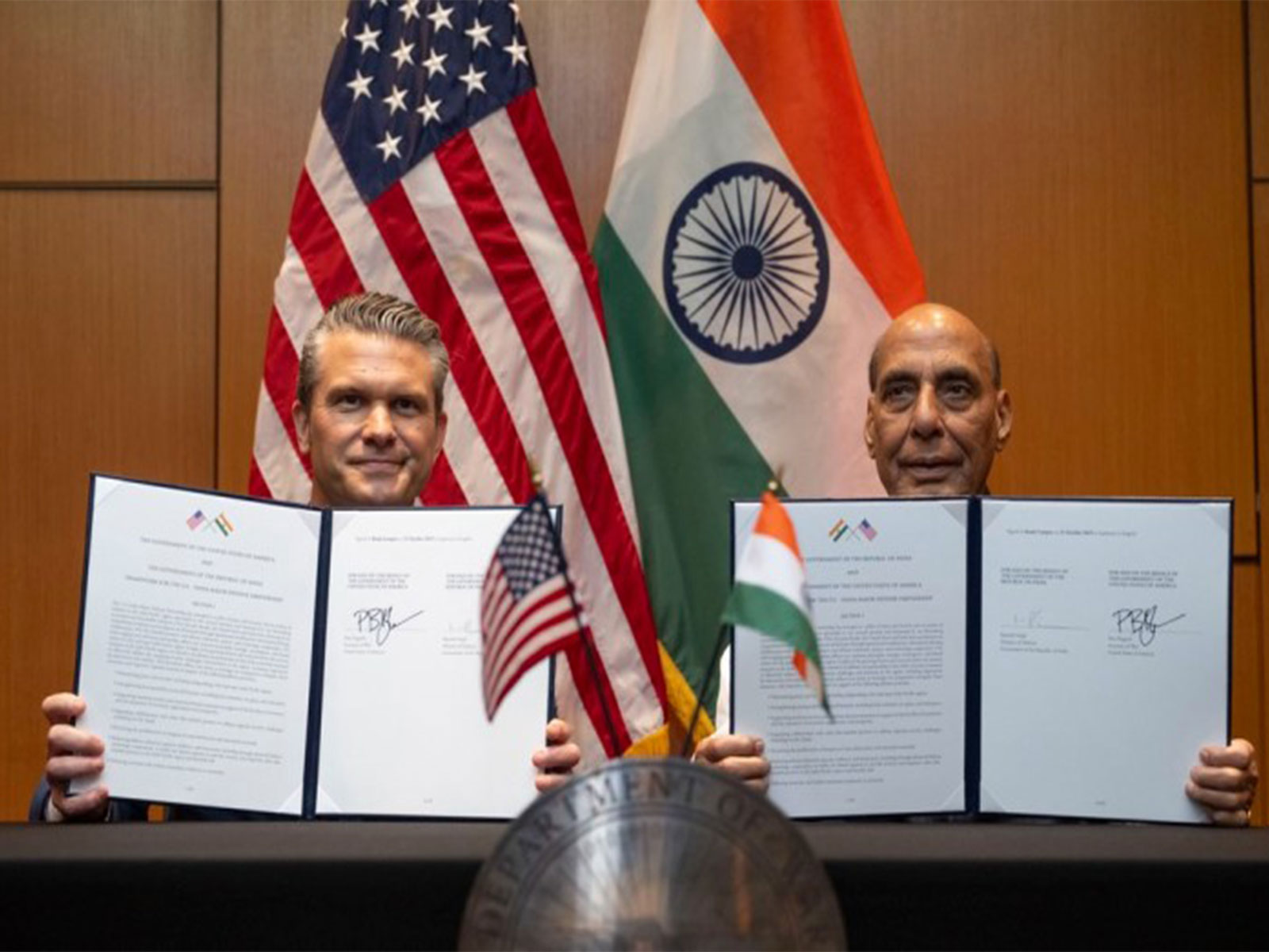 Defence Minister Rajnath Singh and US Secretary of War Pete Hegseth exchange the 10-year Defence Framework Agreement in Kuala Lumpur. (Photo: X/@SecWar) Defence Minister Rajnath Singh and US Secretary of War Pete Hegseth exchange the 10-year Defence Framework Agreement in Kuala Lumpur. (Photo: X/@SecWar)