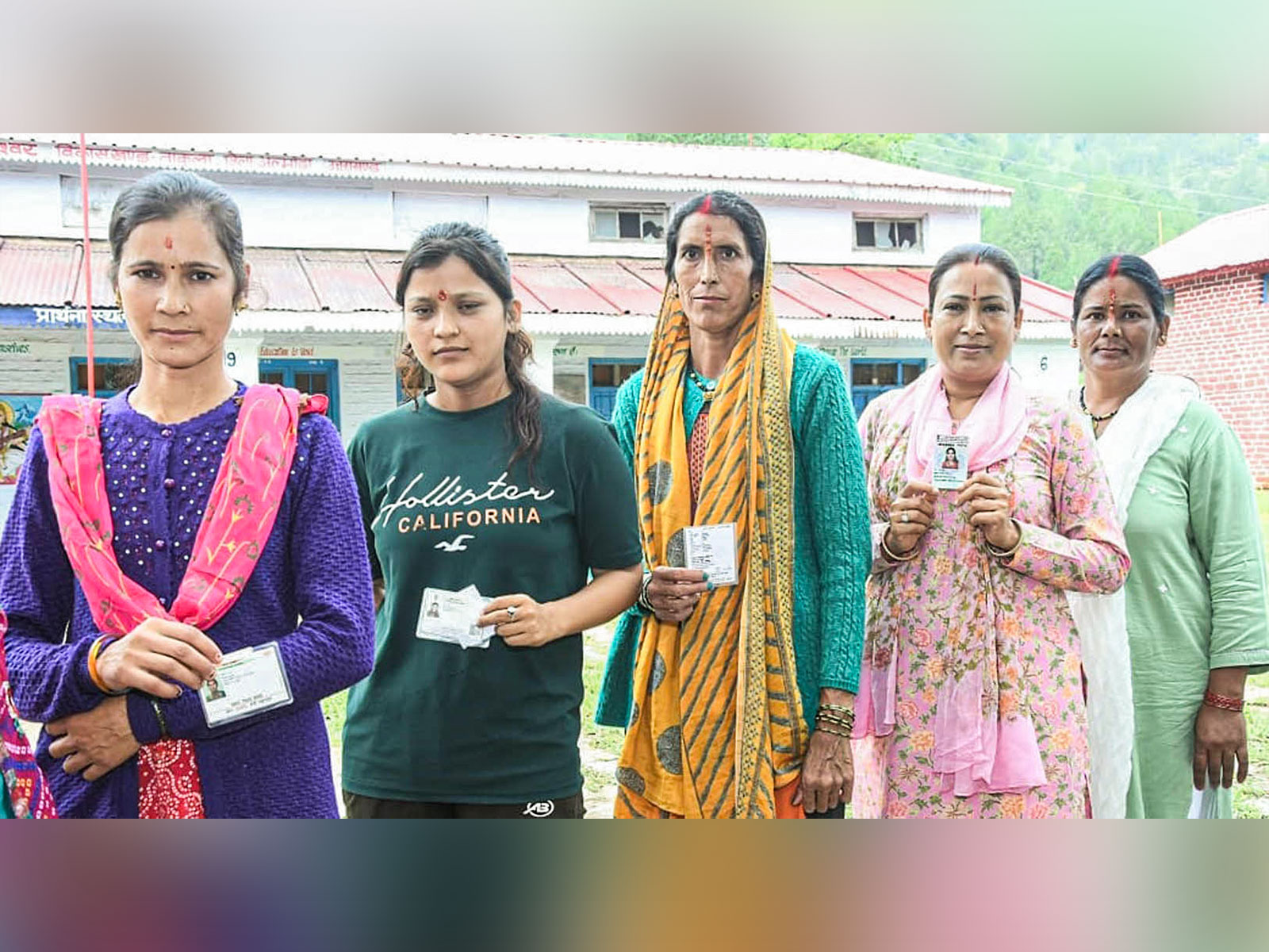 Voters standing in line waiting to cast their vote (Photo/ANI) Voters standing in line waiting to cast their vote (Photo/ANI)