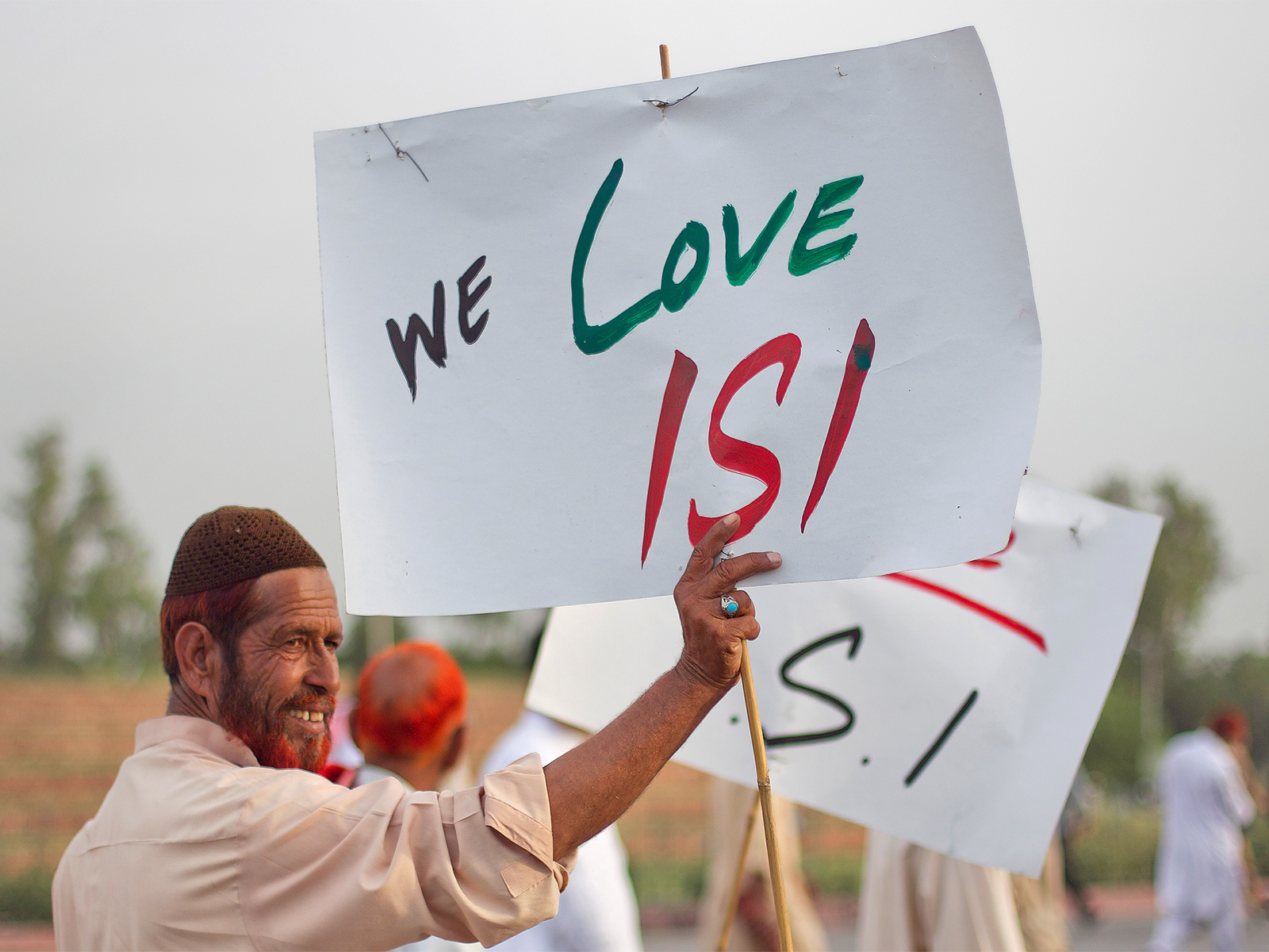 An activist holds a placard as protesters rally in favour of Pakistan's army and Inter-Services Intelligence in Islamabad (File Photo/Reuters) An activist holds a placard as protesters rally in favour of Pakistan's army and Inter-Services Intelligence in Islamabad (File Photo/Reuters)