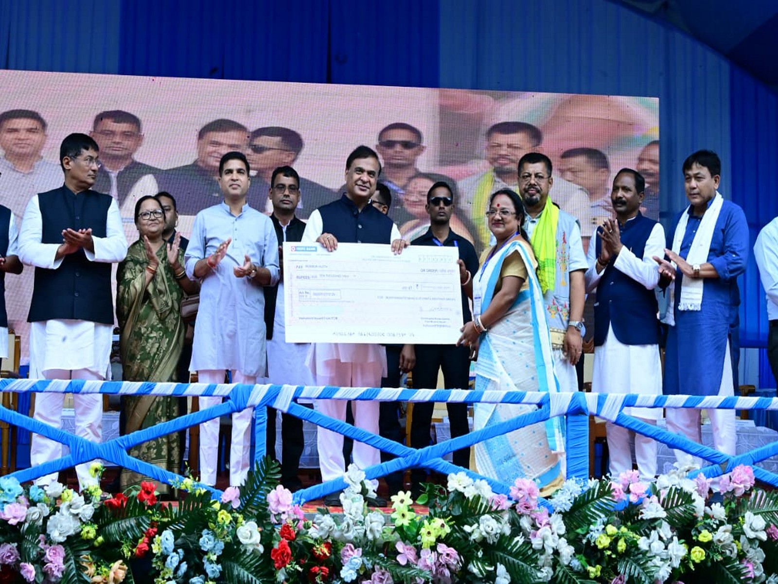 Assam CM Himanta Biswa Sarma distributes cheques under MMUA in Doomdooma LAC. (Photo/ANI) Assam CM Himanta Biswa Sarma distributes cheques under MMUA in Doomdooma LAC. (Photo/ANI)