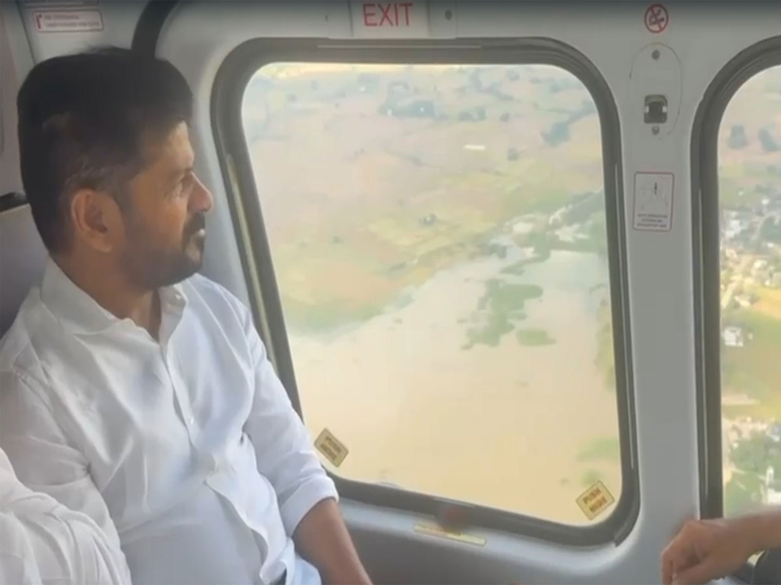 Telangana CM A Revanth Reddy conducts aerial survey of flood-ravaged areas. (Photo/ANI) Telangana CM A Revanth Reddy conducts aerial survey of flood-ravaged areas. (Photo/ANI)