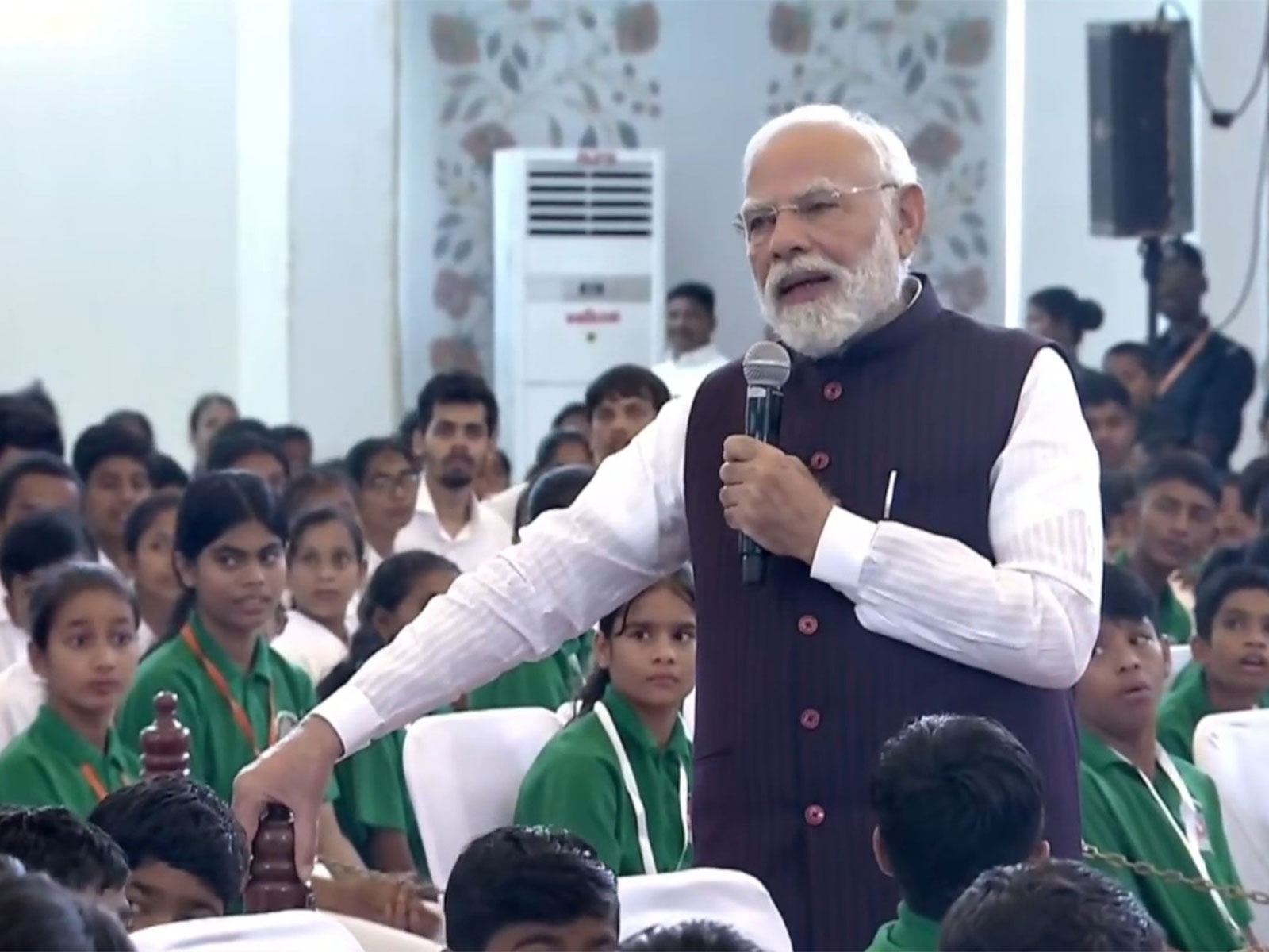 Prime Minister Narendra Modi interacts with children (Photo/ANI/DD news)