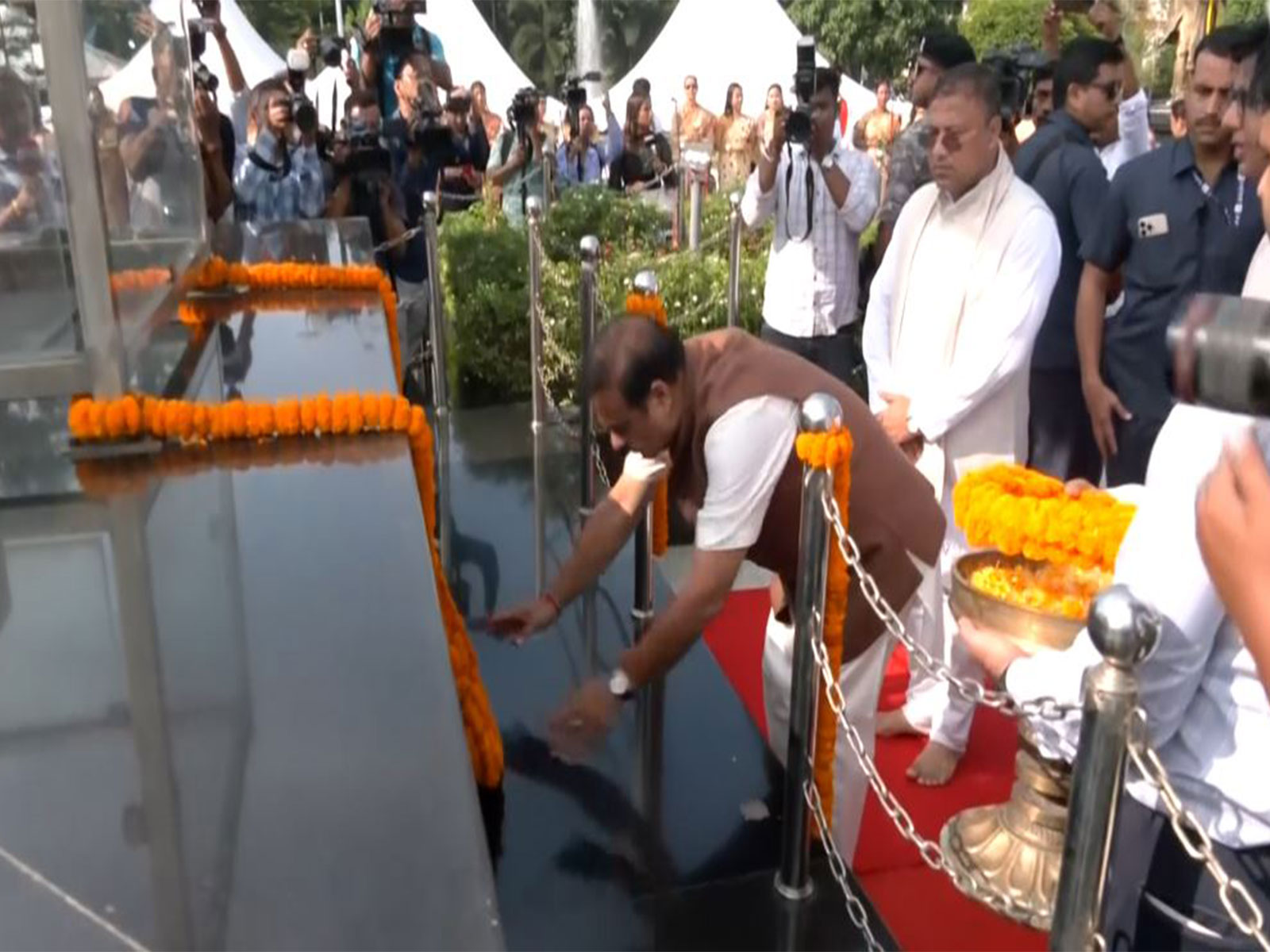 Assam Chief Minister Himanta Biswa Sarma pays tribute to Bhupen Hazarika in Guwahati (Photo/ANI)
