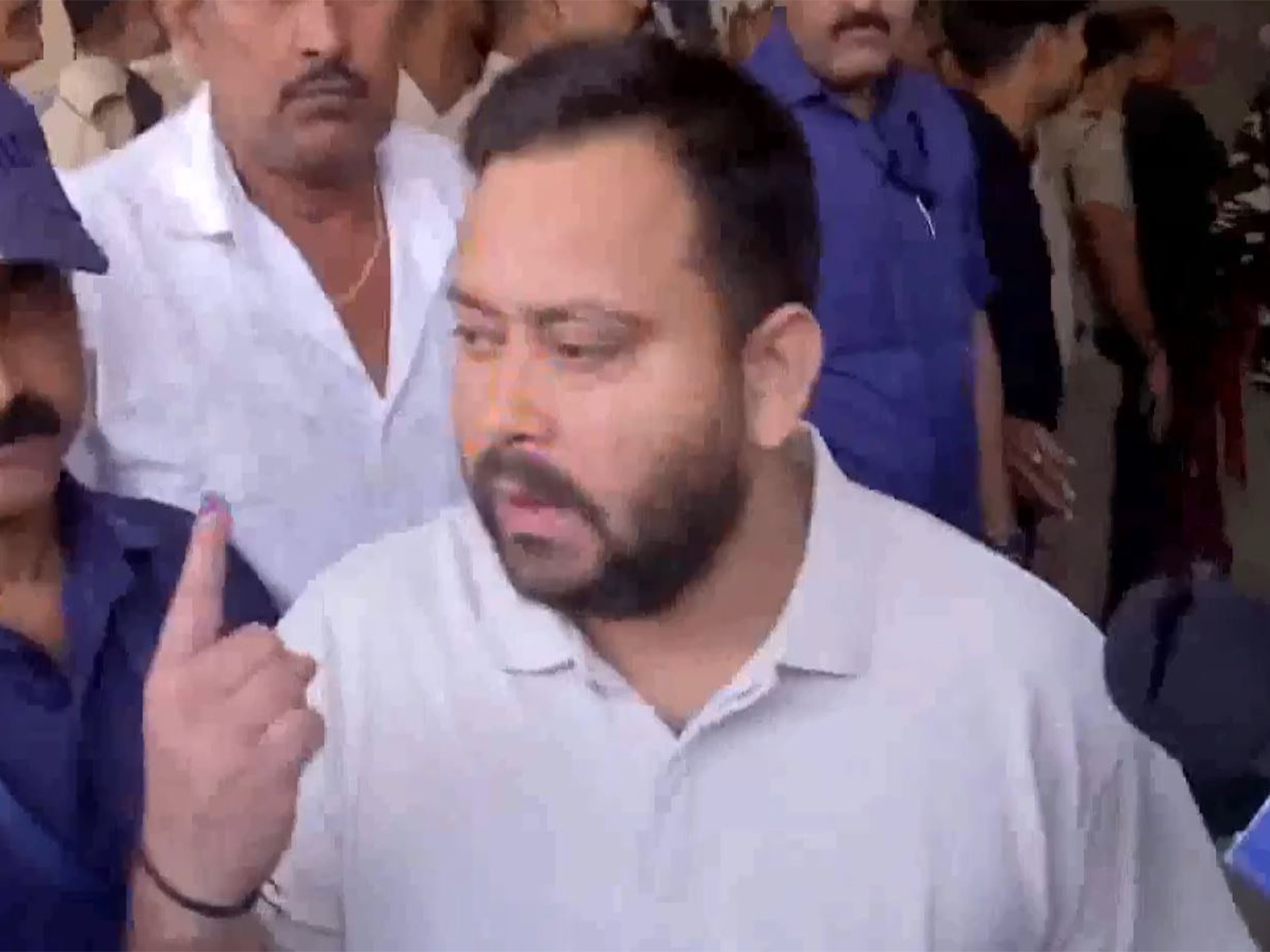 Tejashwi Yadav after casting his vote (Photo/ANI) Tejashwi Yadav after casting his vote (Photo/ANI)