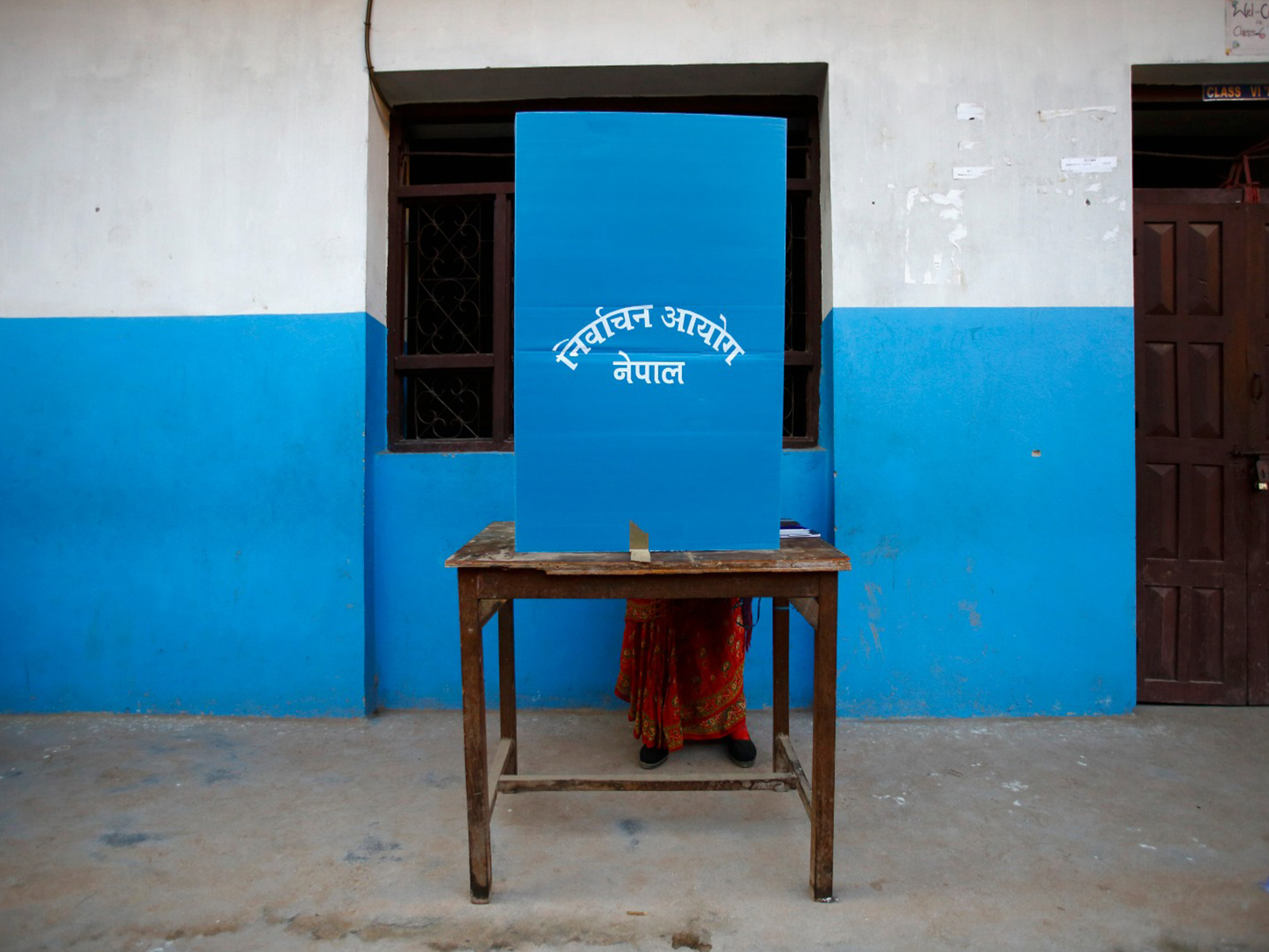 A Nepalese woman casts her vote during the Constituent Assembly Election in Bhaktapur (Photo/Reuters) A Nepalese woman casts her vote during the Constituent Assembly Election in Bhaktapur (Photo/Reuters)