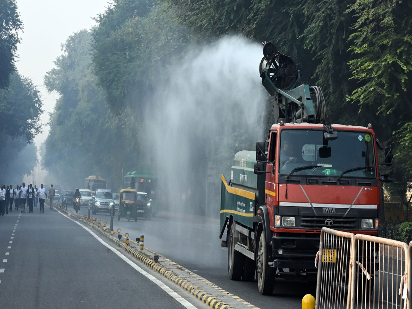 An anti-smog gun sprays water as the Air Quality Index (AQI) reaches 400, in New Delhi on Sunday. (Photo/ANI)