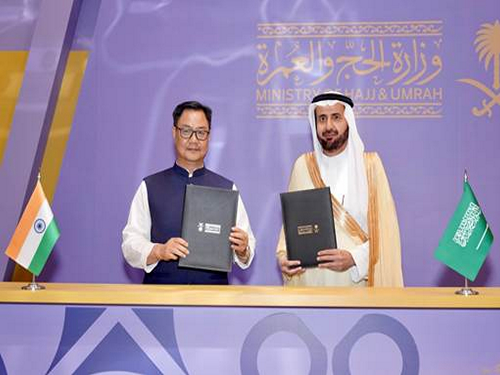Union Minister Kiren Rijiju with Saudi Minister of Hajj and Umrah Tawfiq bin Fawzan Al Rabiah after signing the Bilateral Haj Agreement for 2026 in Jeddah, Saudi Arabia (Image Source: PIB) Union Minister Kiren Rijiju with Saudi Minister of Hajj and Umrah Tawfiq bin Fawzan Al Rabiah after signing the Bilateral Haj Agreement for 2026 in Jeddah, Saudi Arabia (Image Source: PIB)
