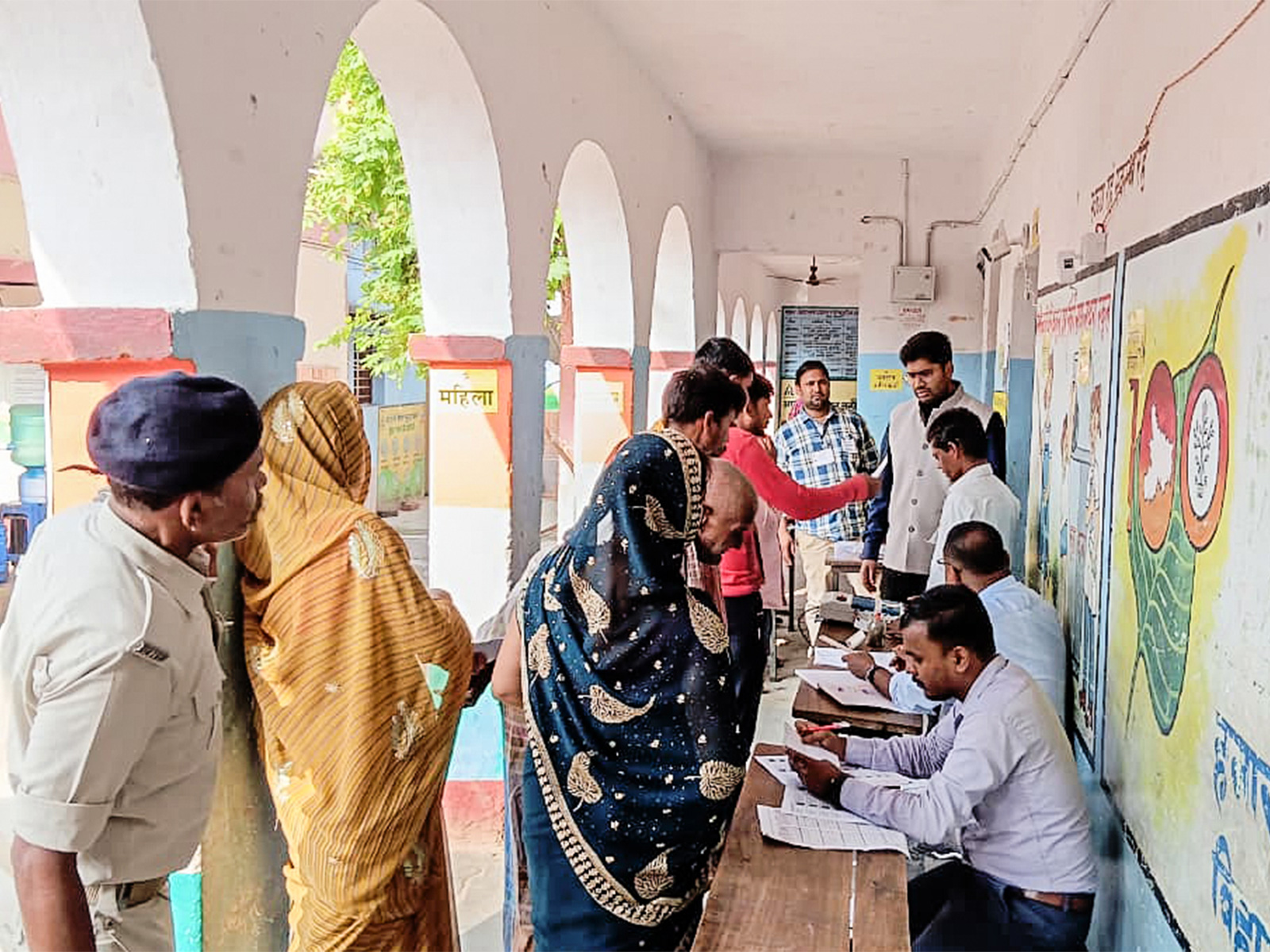 Voters wait in queue to cast their votes for the first phase of the Bihar Assembly elections (File Photo/ANI)