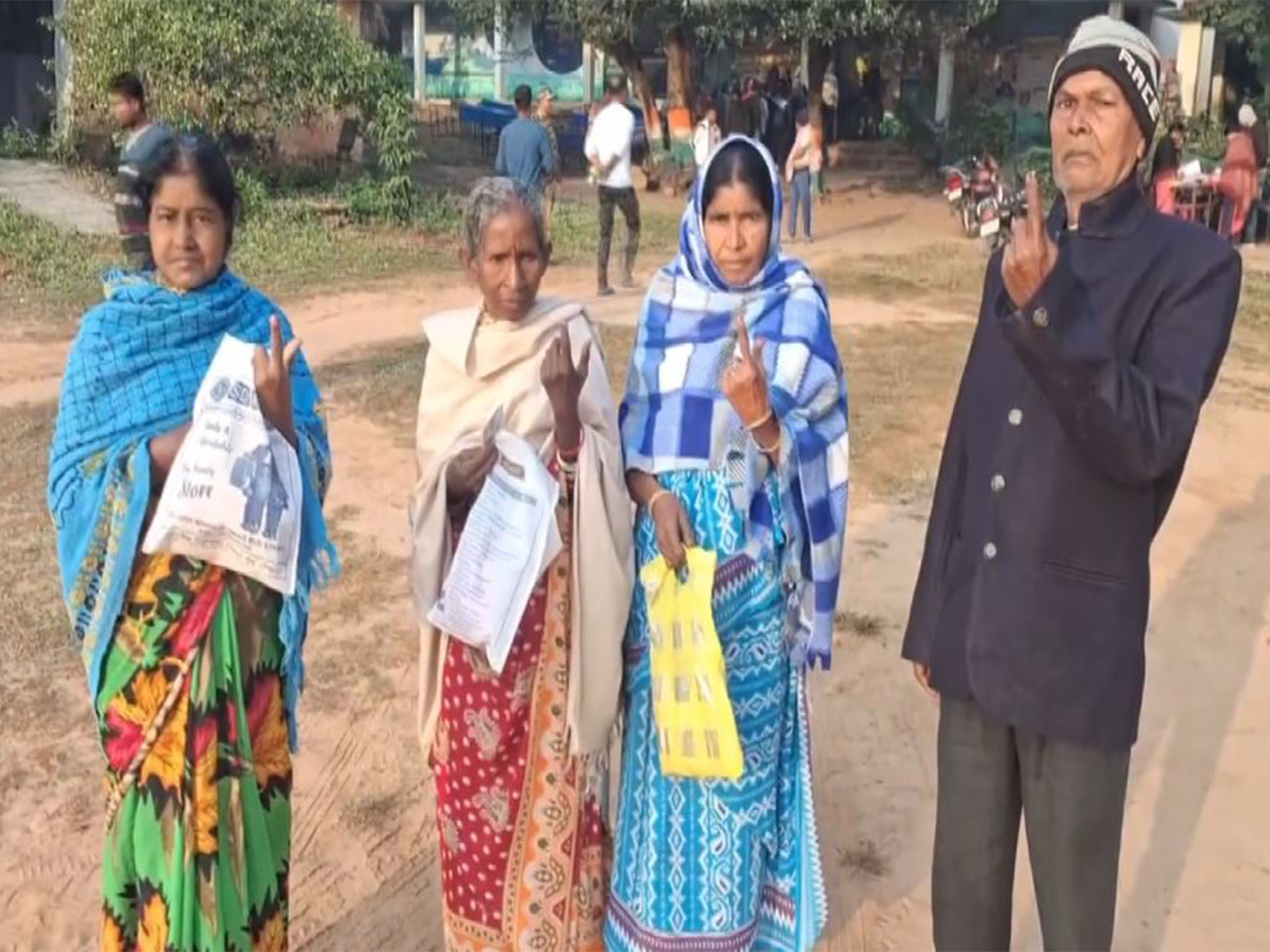 Voters display their inked fingers after casting their votes in Ghatsila Assembly by-election in Jamshedpur (Photo/ANI) Voters display their inked fingers after casting their votes in Ghatsila Assembly by-election in Jamshedpur (Photo/ANI)