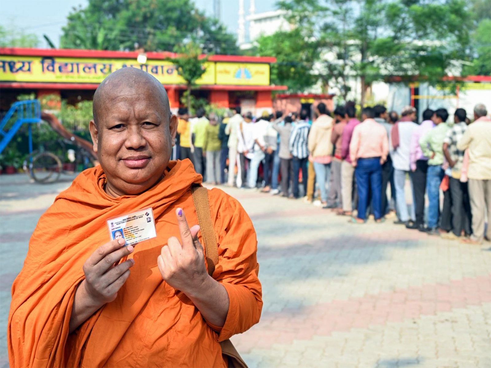 A monk shows his ink-marked finger after casting his vote in Gaya in the second phase of the Bihar assembly election (Photo/ANI) A monk shows his ink-marked finger after casting his vote in Gaya in the second phase of the Bihar assembly election (Photo/ANI)