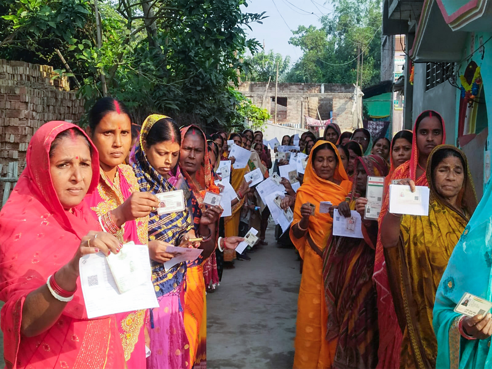 Women voters wait in a queue to cast their vote in Katihar in the second phase of the Bihar assembly election (Photo/ANI) Women voters wait in a queue to cast their vote in Katihar in the second phase of the Bihar assembly election (Photo/ANI)