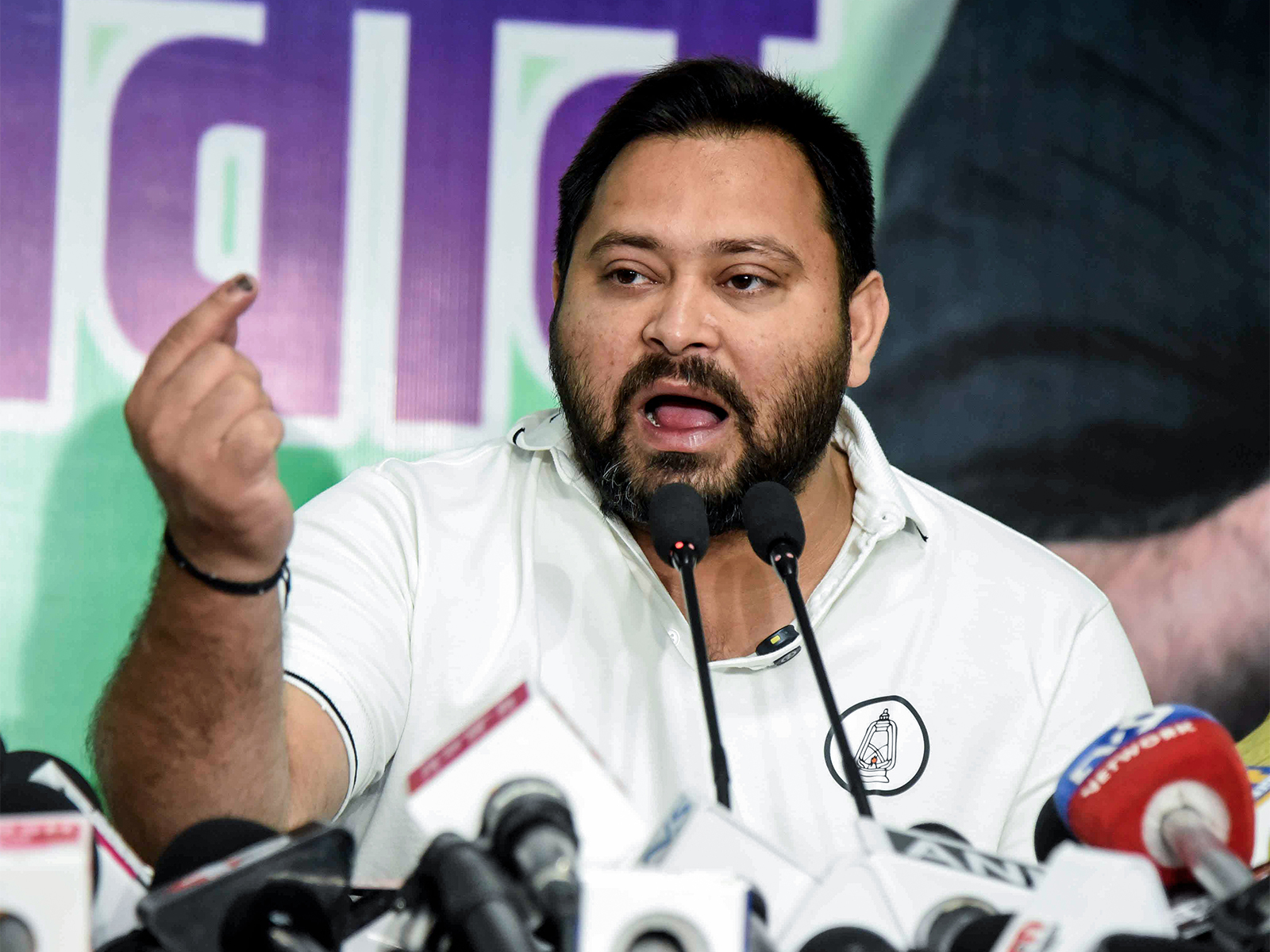 RJD leader and Mahagathabandhan's CM face Tejashwi Yadav (File Photo/ANI) RJD leader and Mahagathabandhan's CM face Tejashwi Yadav (File Photo/ANI)