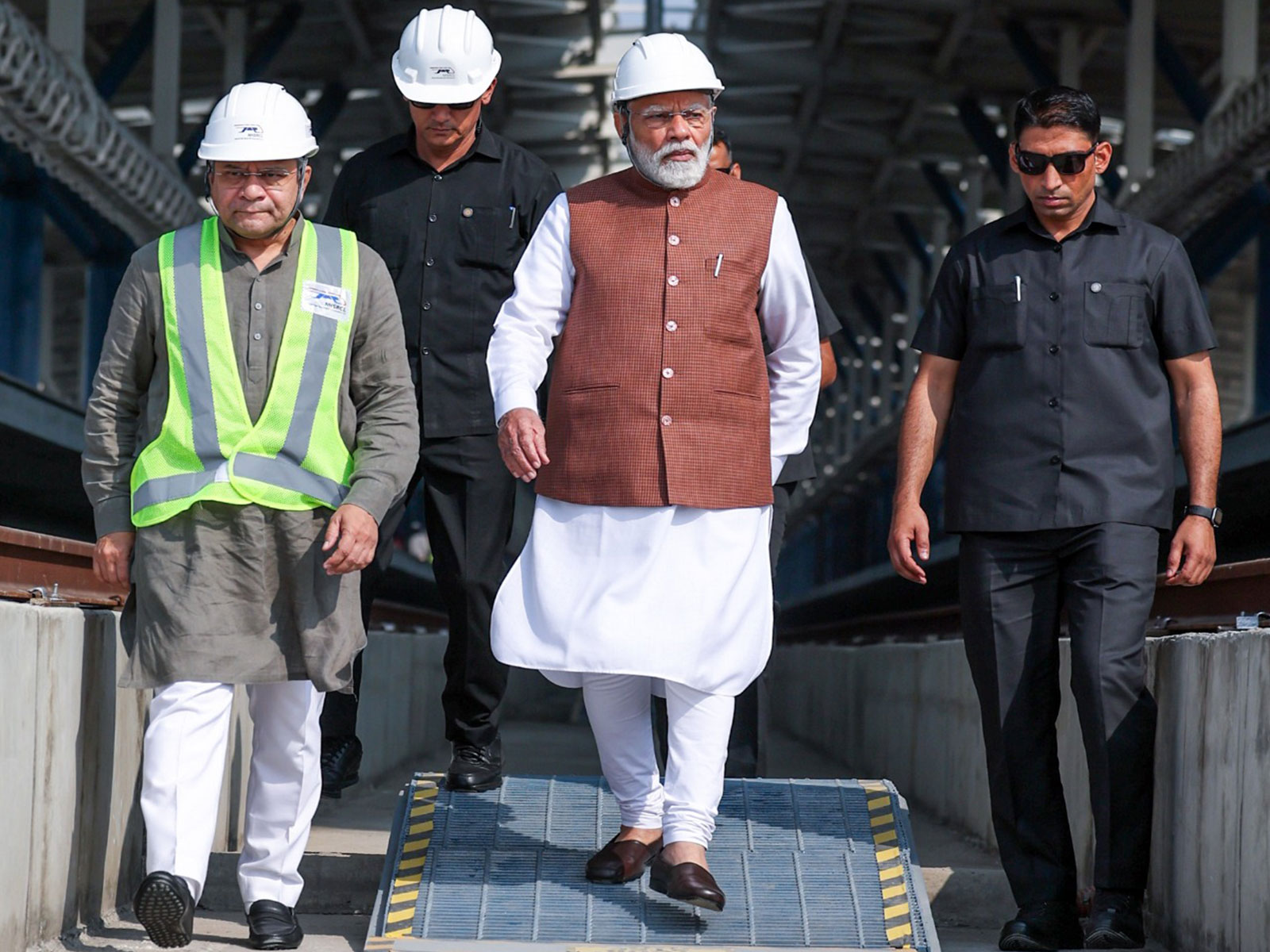 Prime Minister Narendra Modi, during his visit to review the progress of the Mumbai-Ahmedabad bullet train project at the under-construction Surat bullet train station (Photo: DPR PMO/ANI)