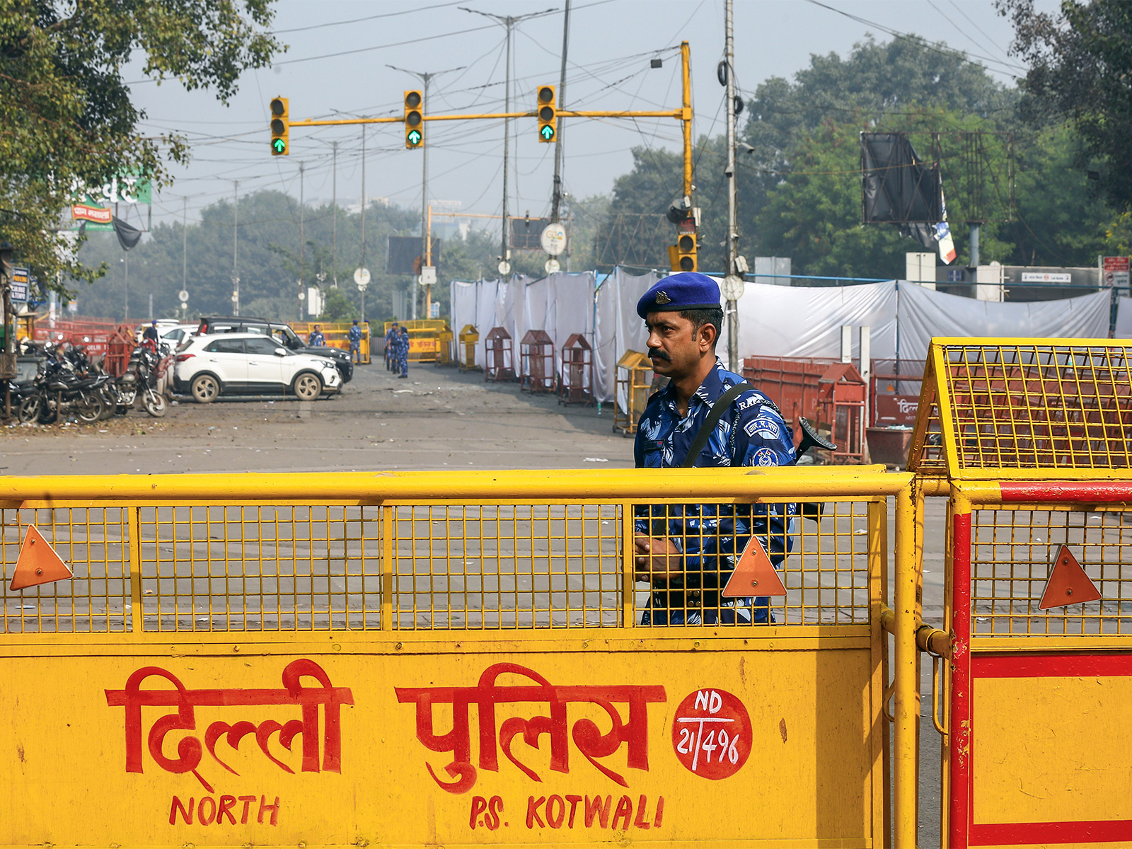Rapid Action Force stand guard at Red Fort car blast site in New Delhi. (Photo/ANI) Rapid Action Force stand guard at Red Fort car blast site in New Delhi. (Photo/ANI)