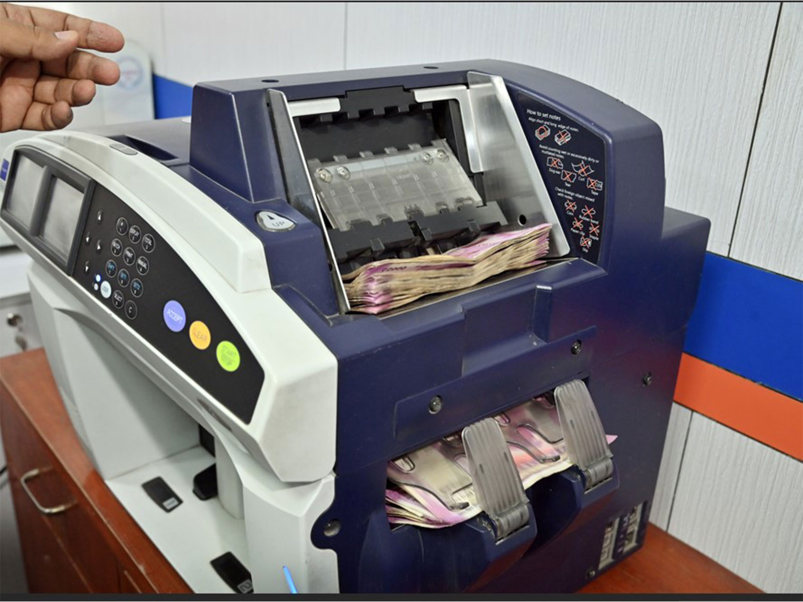 Currency counting machine (File Photo/ANI) Currency counting machine (File Photo/ANI)