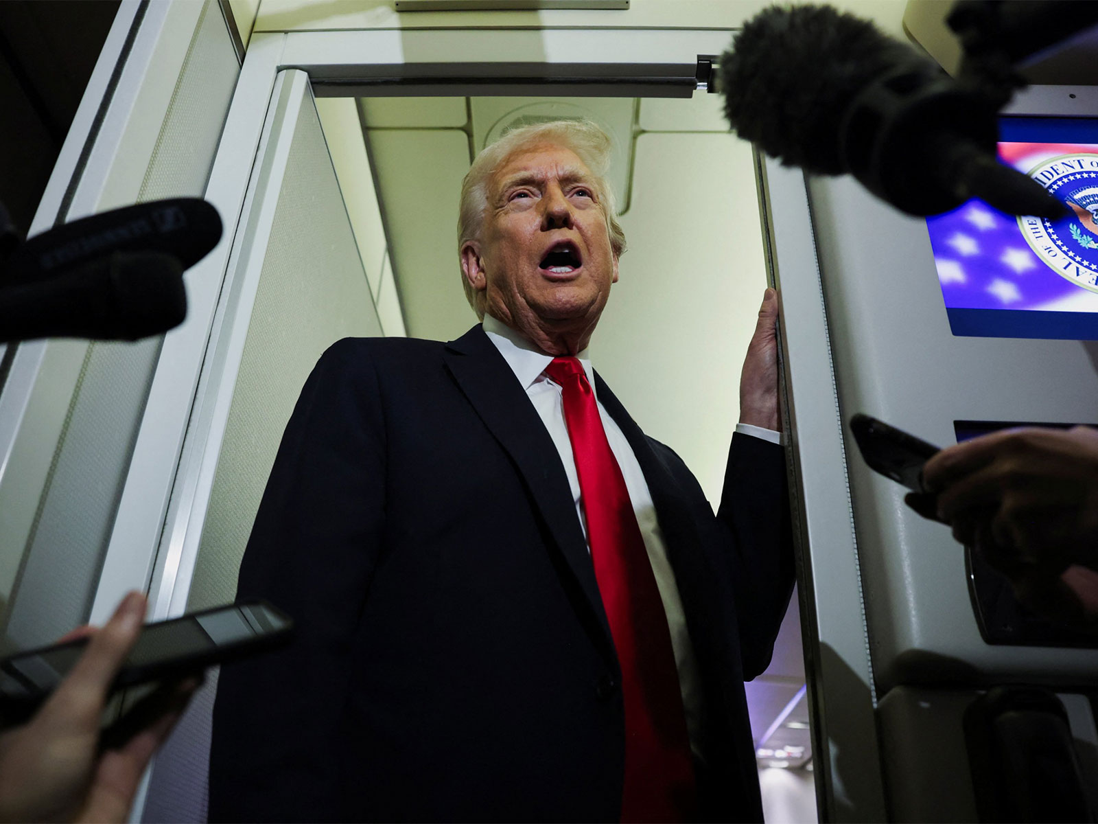 US President Donald Trump onboard Air Force One (Photo/ Reuters) US President Donald Trump onboard Air Force One (Photo/ Reuters)
